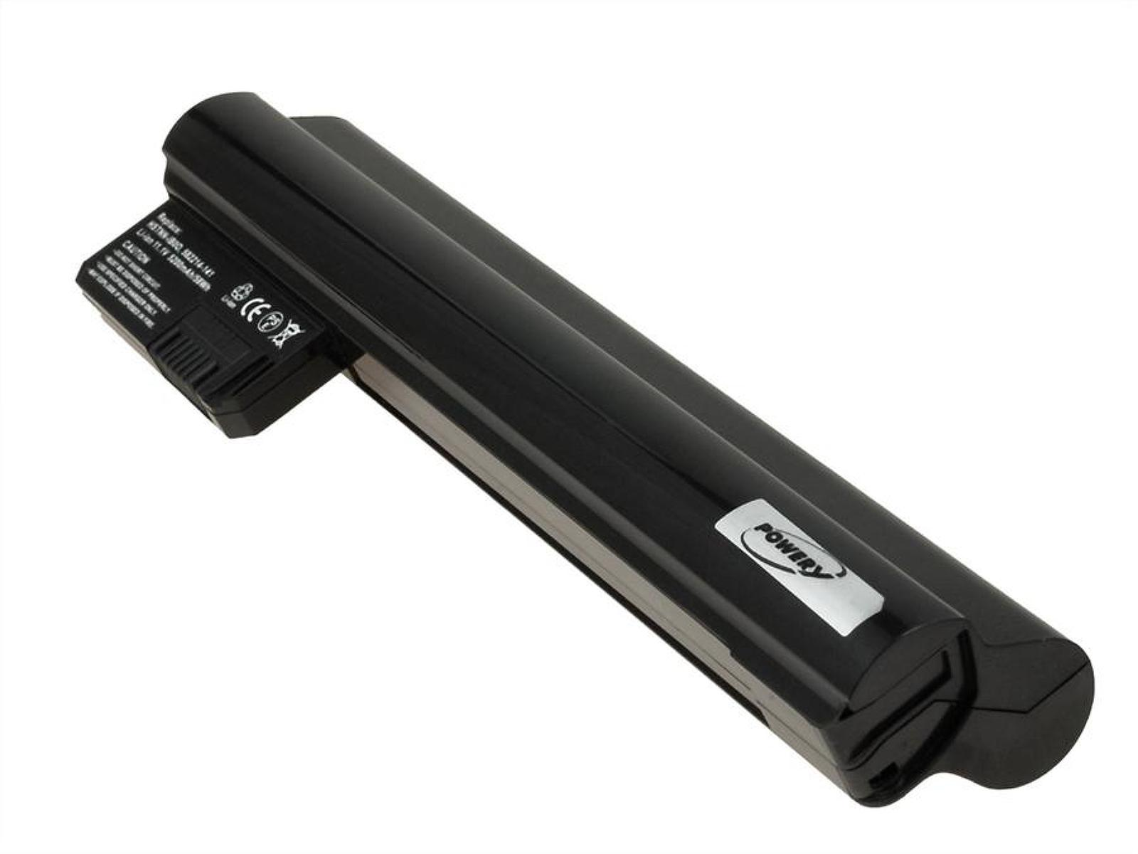 Una batería negra para portátil con una etiqueta plateada. Es cilíndrica y tiene un pequeño conector.