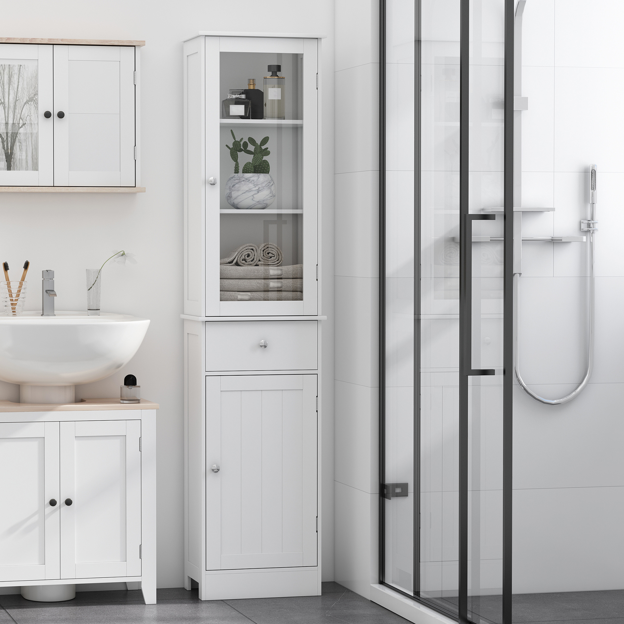 Un mueble de baño blanco con frente de cristal, lavabo y ducha.