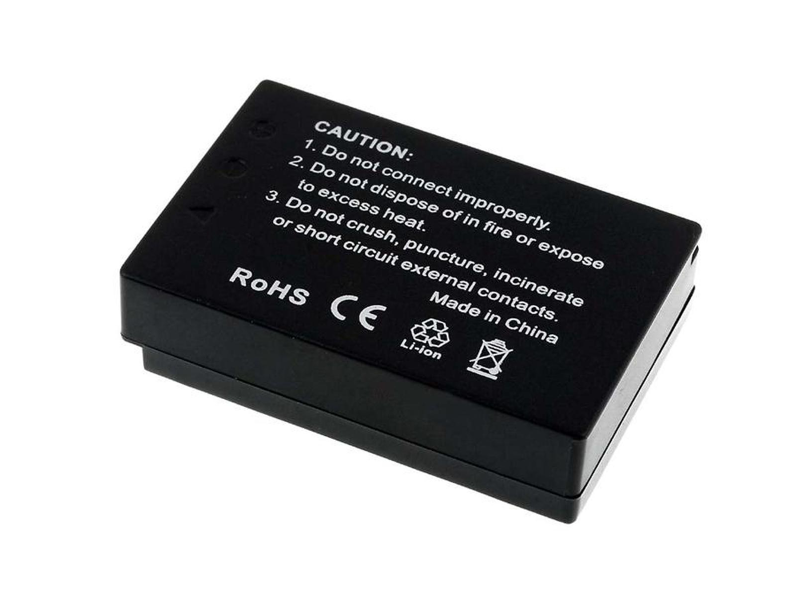 Schwarze Batterie mit Vorsichtshinweisen. Weißer Hintergrund.