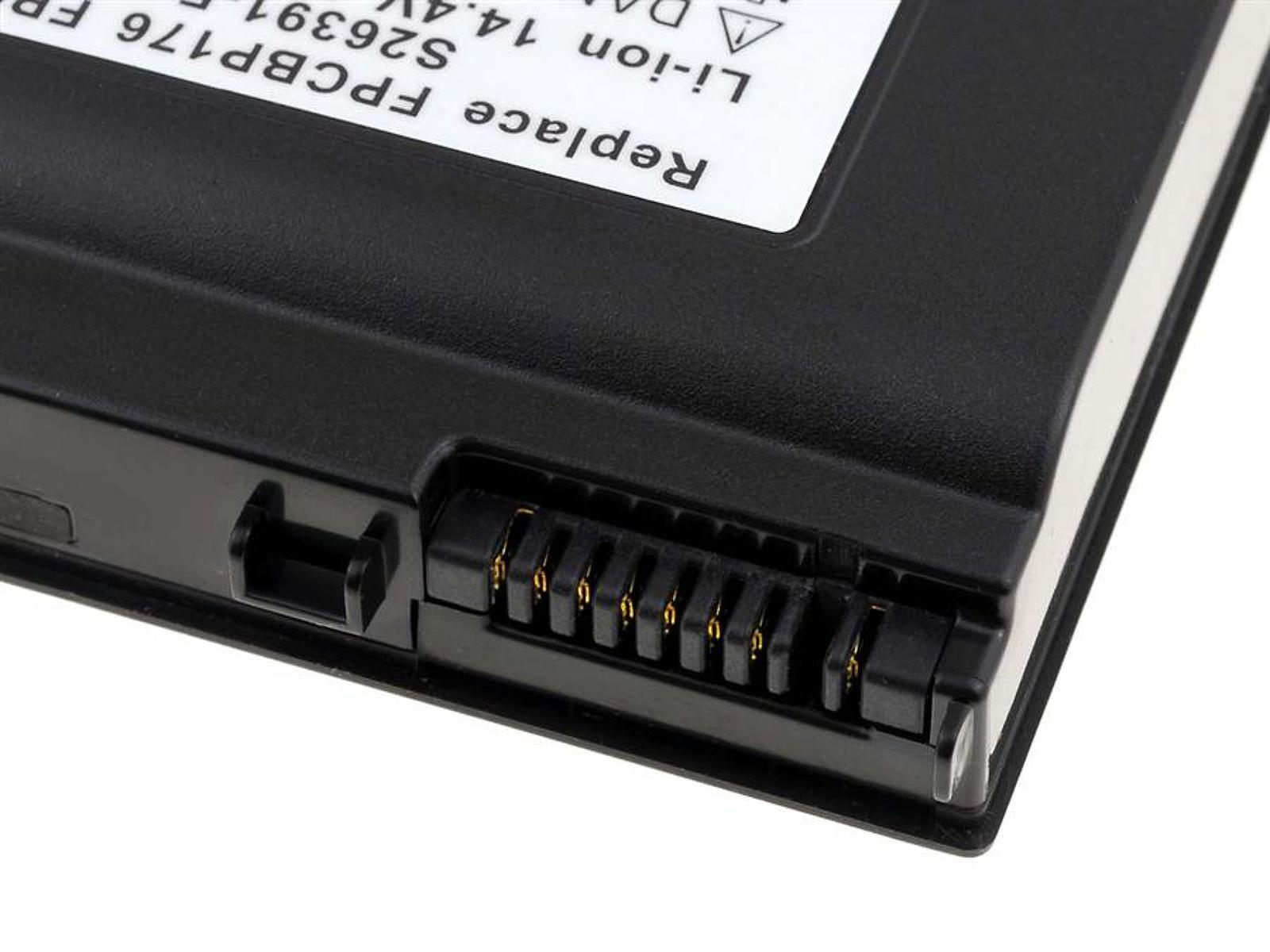 Una batería negra con una etiqueta blanca. Tiene un conector negro con pines dorados.