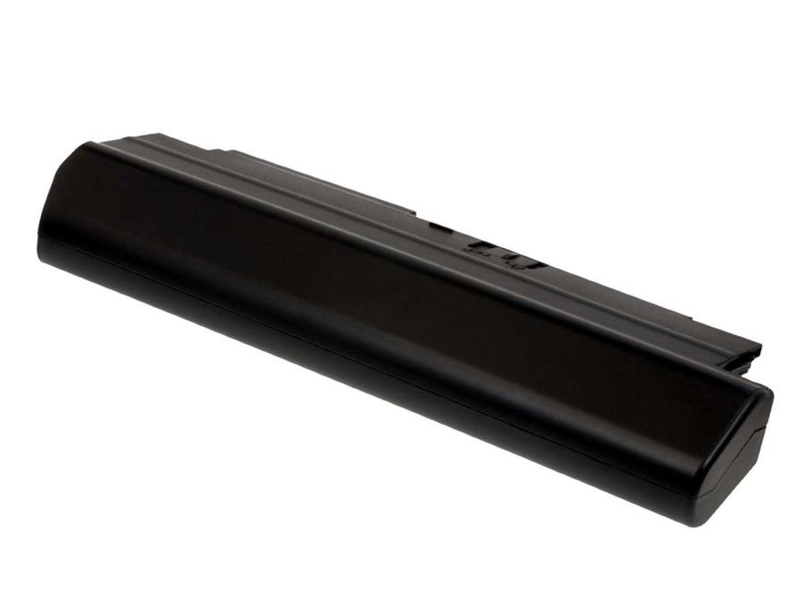 Una batería negra, rectangular y larga, con la parte superior ligeramente curvada, sobre una superficie blanca.