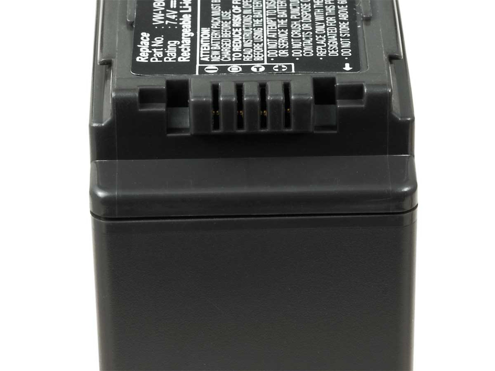 Primer plano de una batería negra, con forma rectangular y diseño acanalado en la parte superior.
