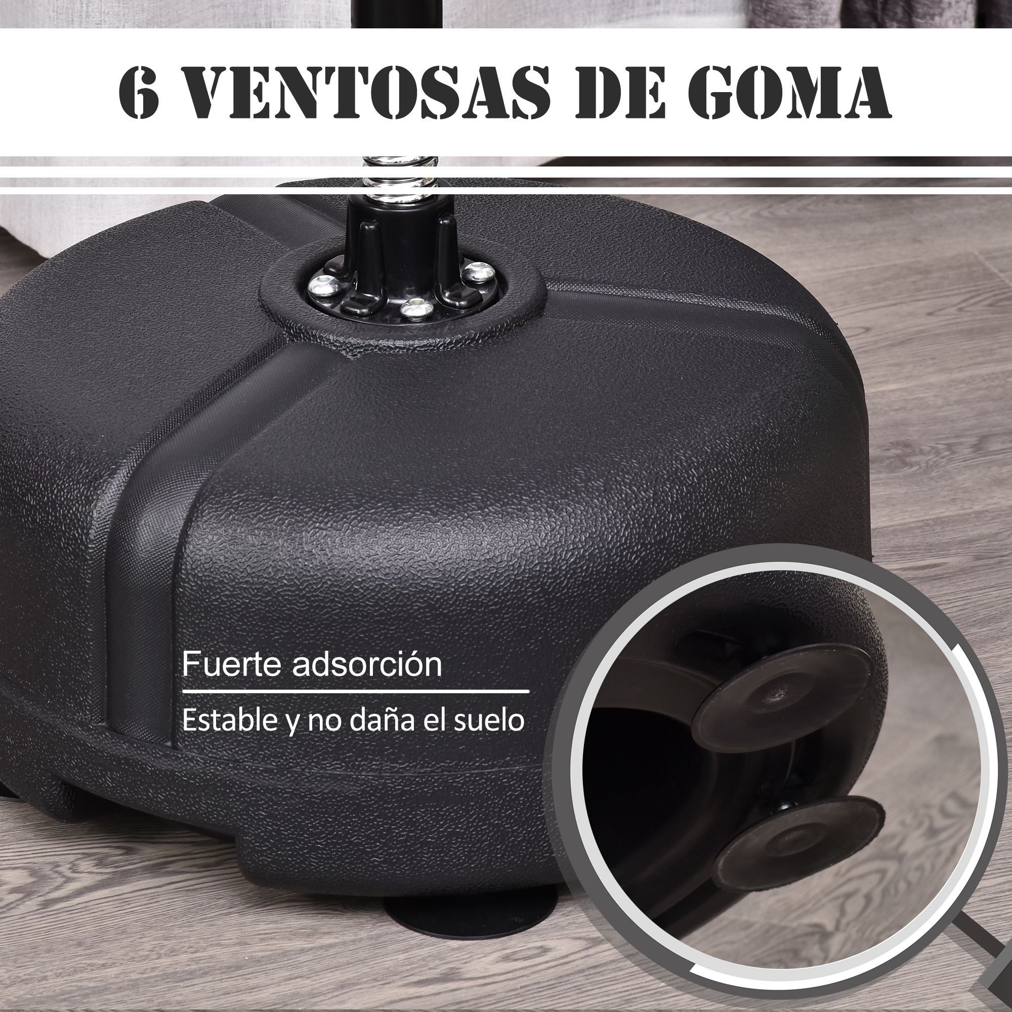 Base negra de saco de boxeo con ventosas. La base está sobre un suelo de madera.