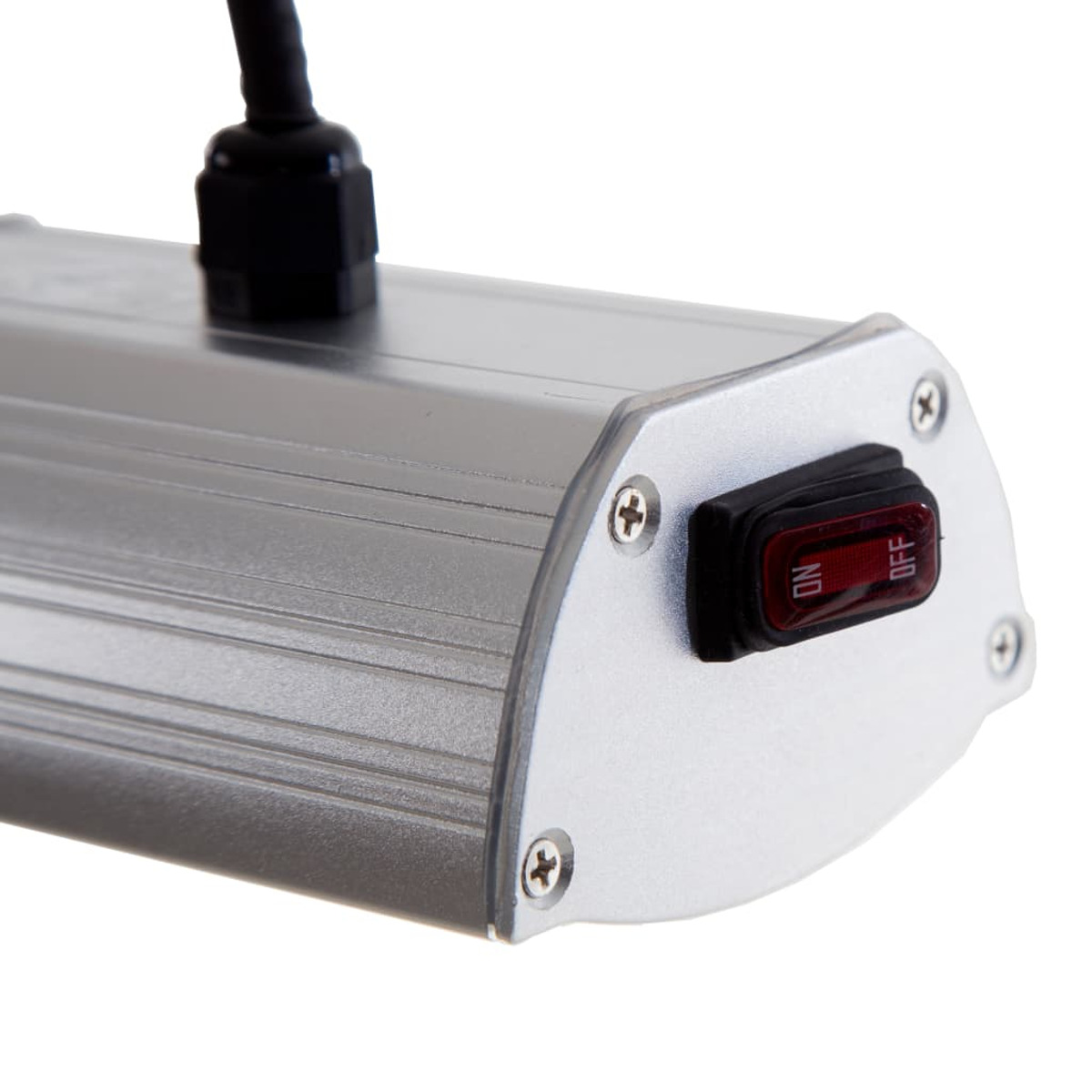 Silver metal device with an ON/OFF switch. A black cord is attached to the top.