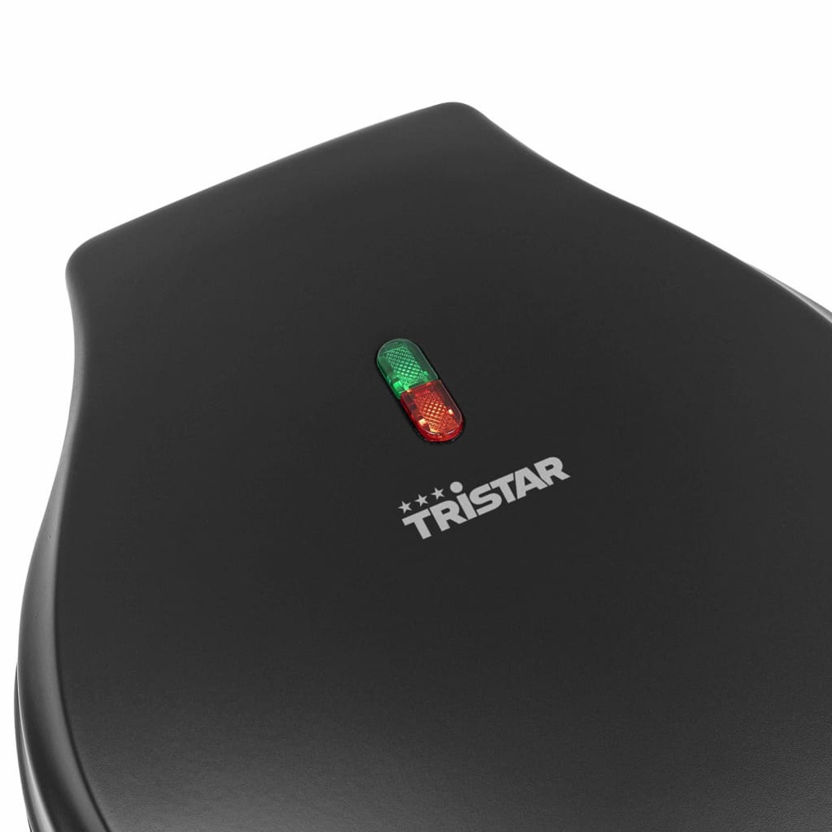 Czarny sprzęt Tristar z zielonymi i czerwonymi kontrolkami.
