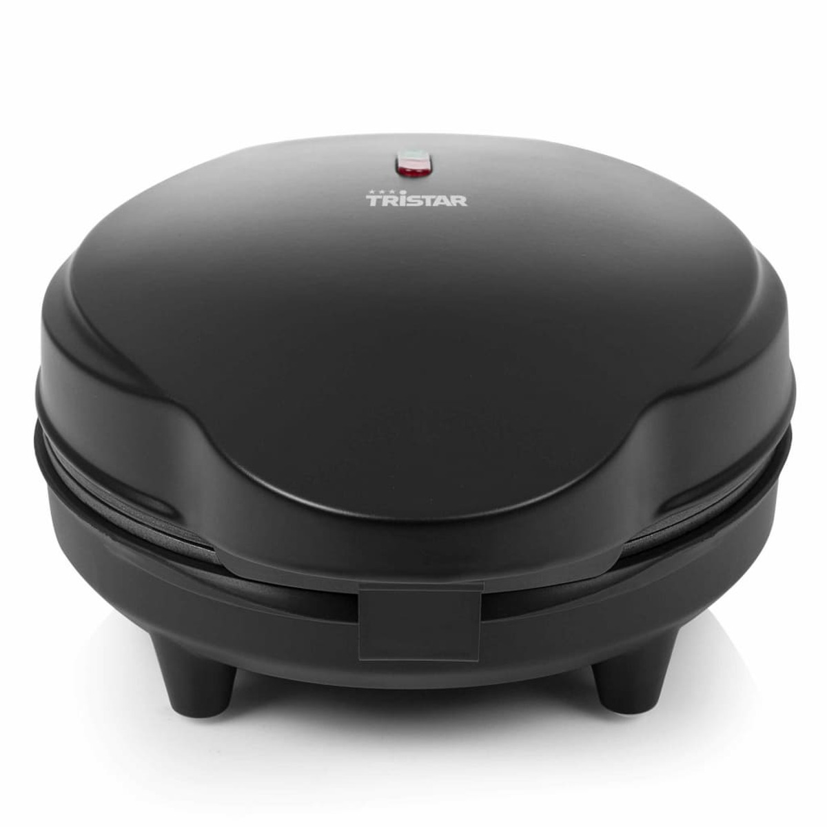 Czarny gofrownica na białym tle. Widok z góry, zamknięty, z trzema nóżkami.