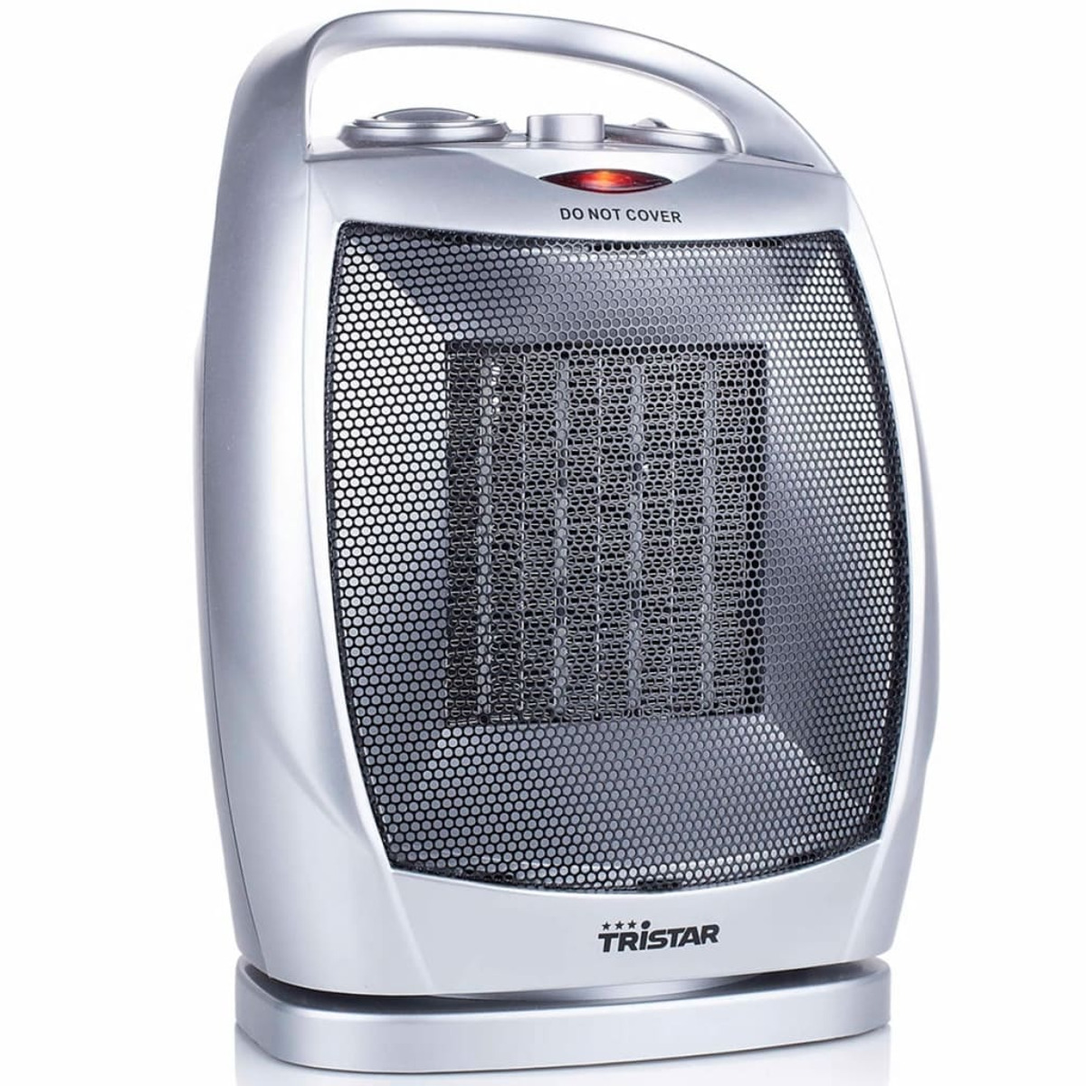 Chauffage Tristar argenté avec une grille noire, une poignée et une lumière rouge en haut.
