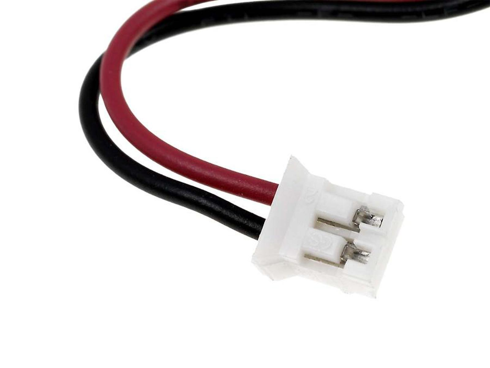 Primer plano de un conector blanco con cables rojos y negros que se extienden desde él.