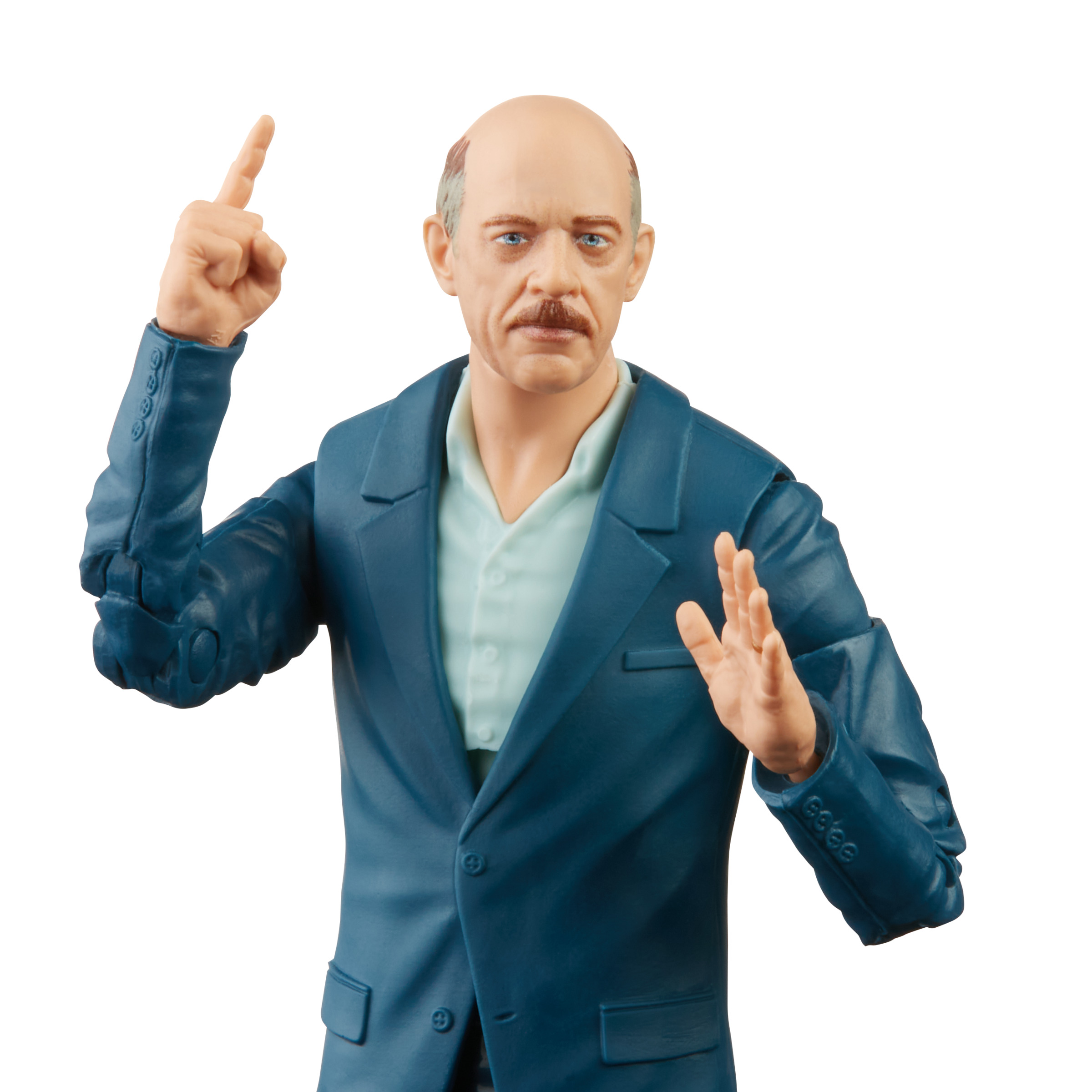 Un hombre calvo con traje azul señala hacia arriba y gesticula con la otra mano.