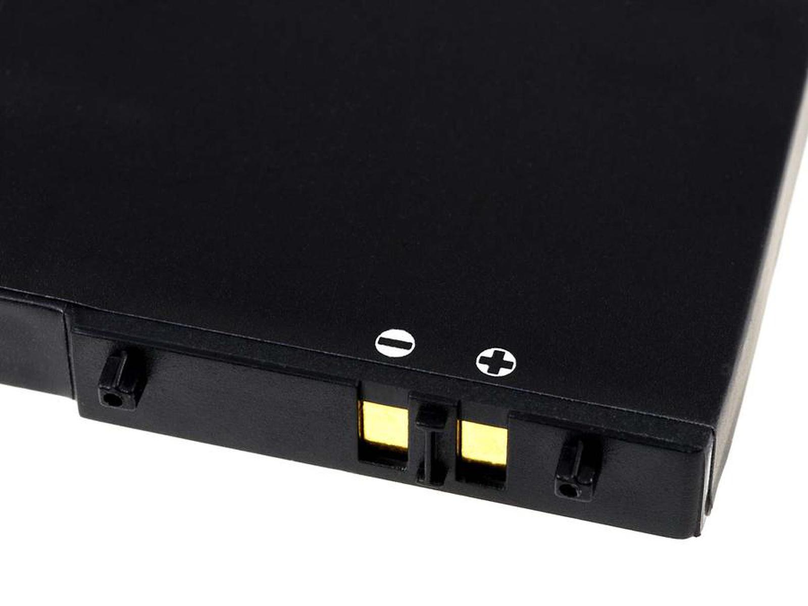 Nahaufnahme einer schwarzen Batterie mit Plus- und Minusmarkierungen auf der Oberseite.