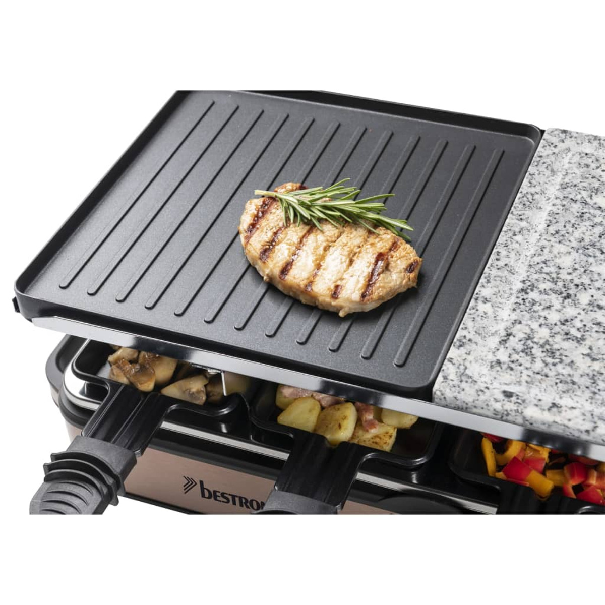 Grill do raclette z gotowanym mięsem, warzywami i przegródkami na ser.