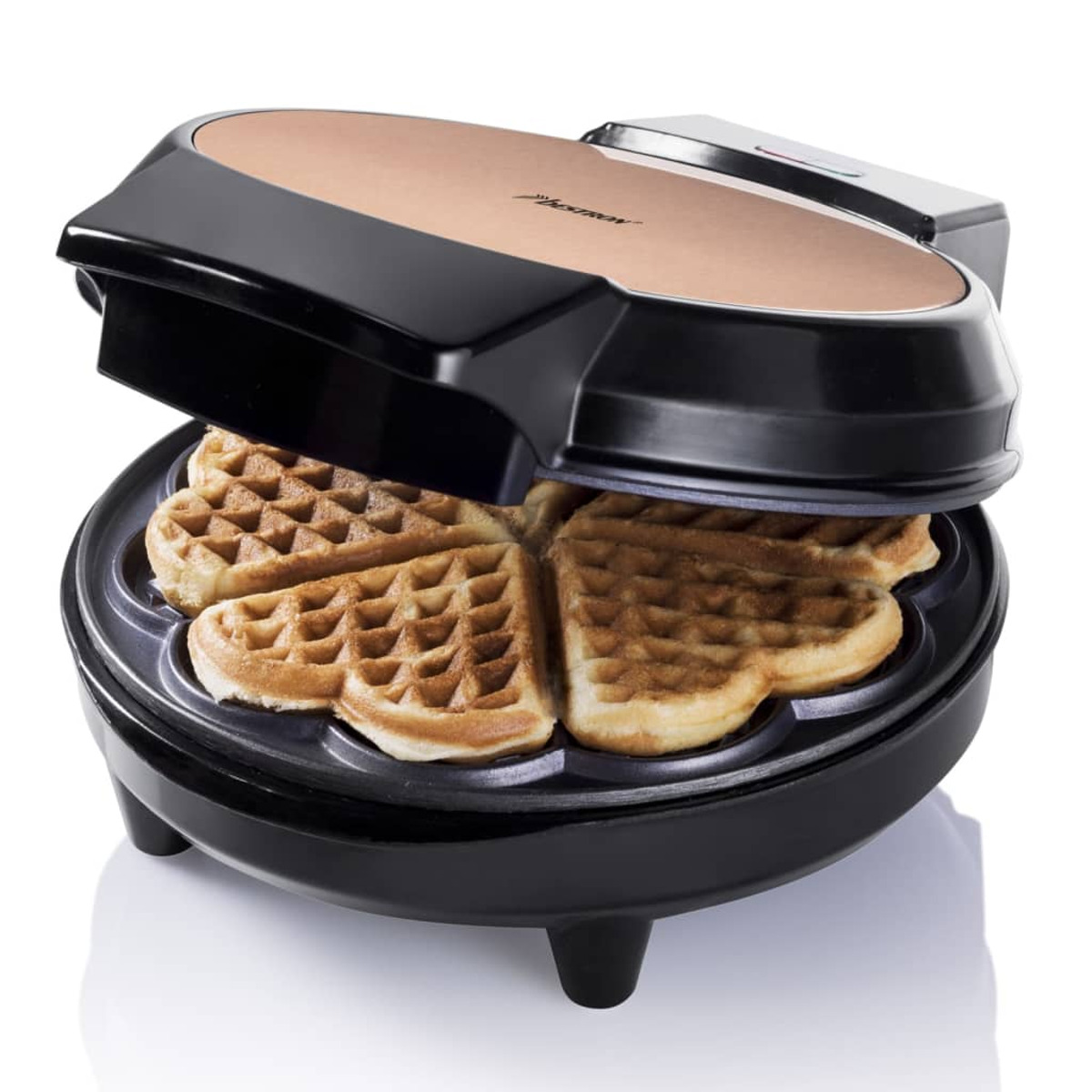 Gofrownica z czterema goframi w kształcie serca. Urządzenie jest czarne i miedziane.