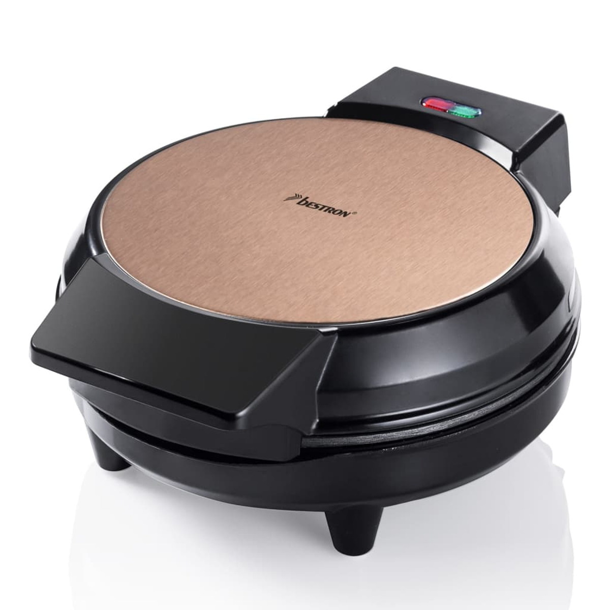 Czarny gofrownica ze złotą górą. Gofrownica na białym tle.