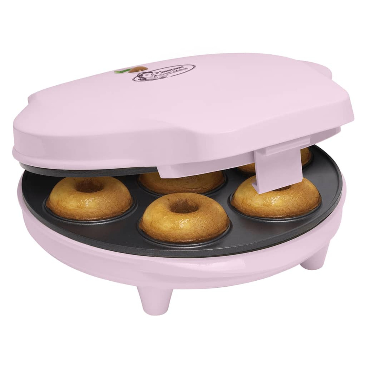 Una máquina para hacer donuts rosa con seis donuts dorados dentro. La tapa está abierta.