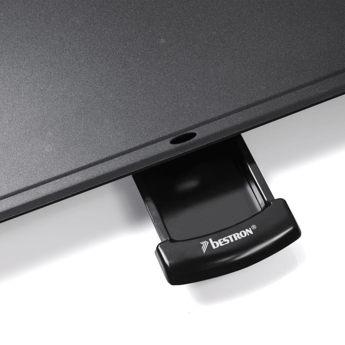 Una piastra nera con un cassetto. Il marchio 'BESTRON' è visibile sul cassetto. Sfondo bianco.