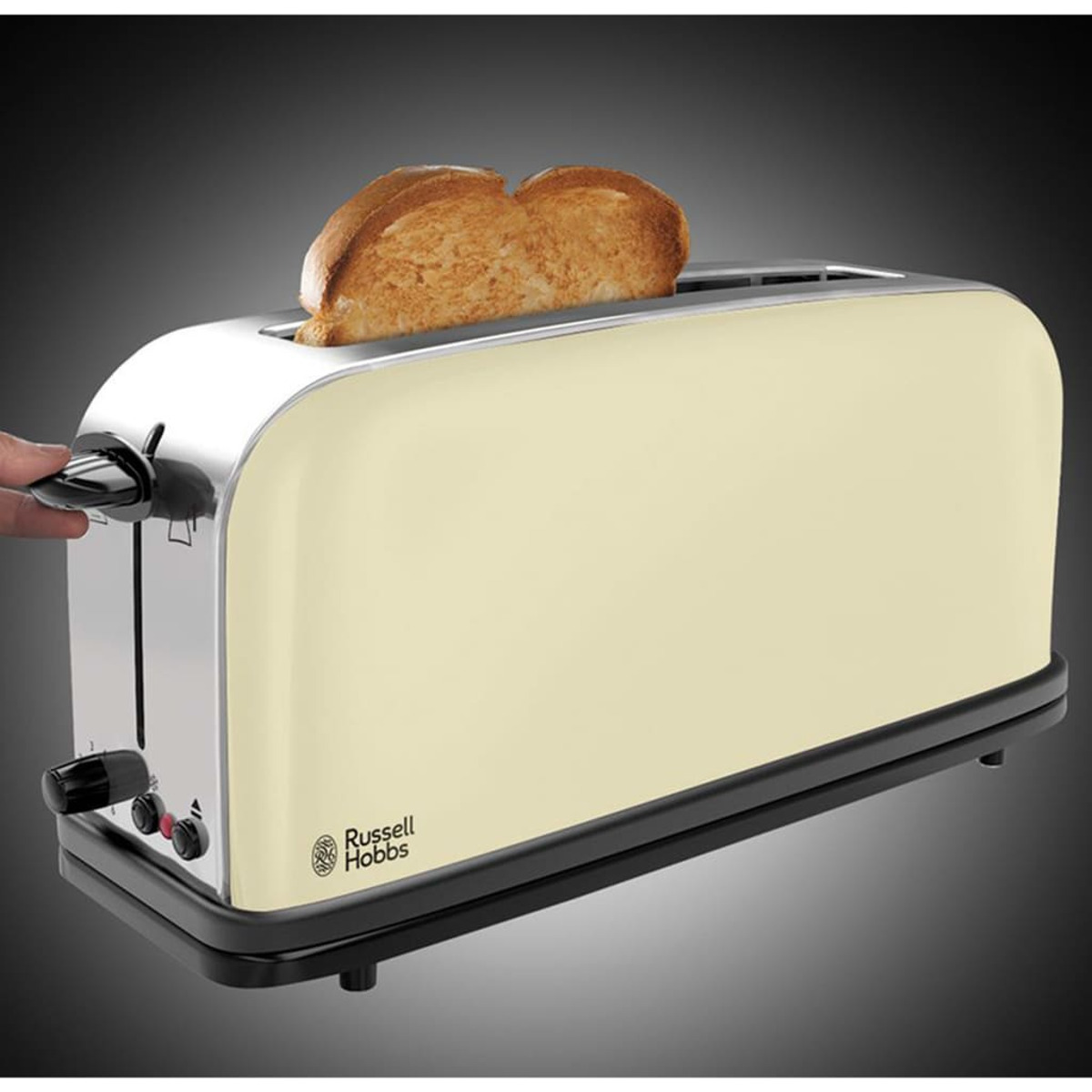 Kremowy toster z dwoma kromkami tostowanego chleba. Widoczna czarna podstawa i dźwignia boczna.