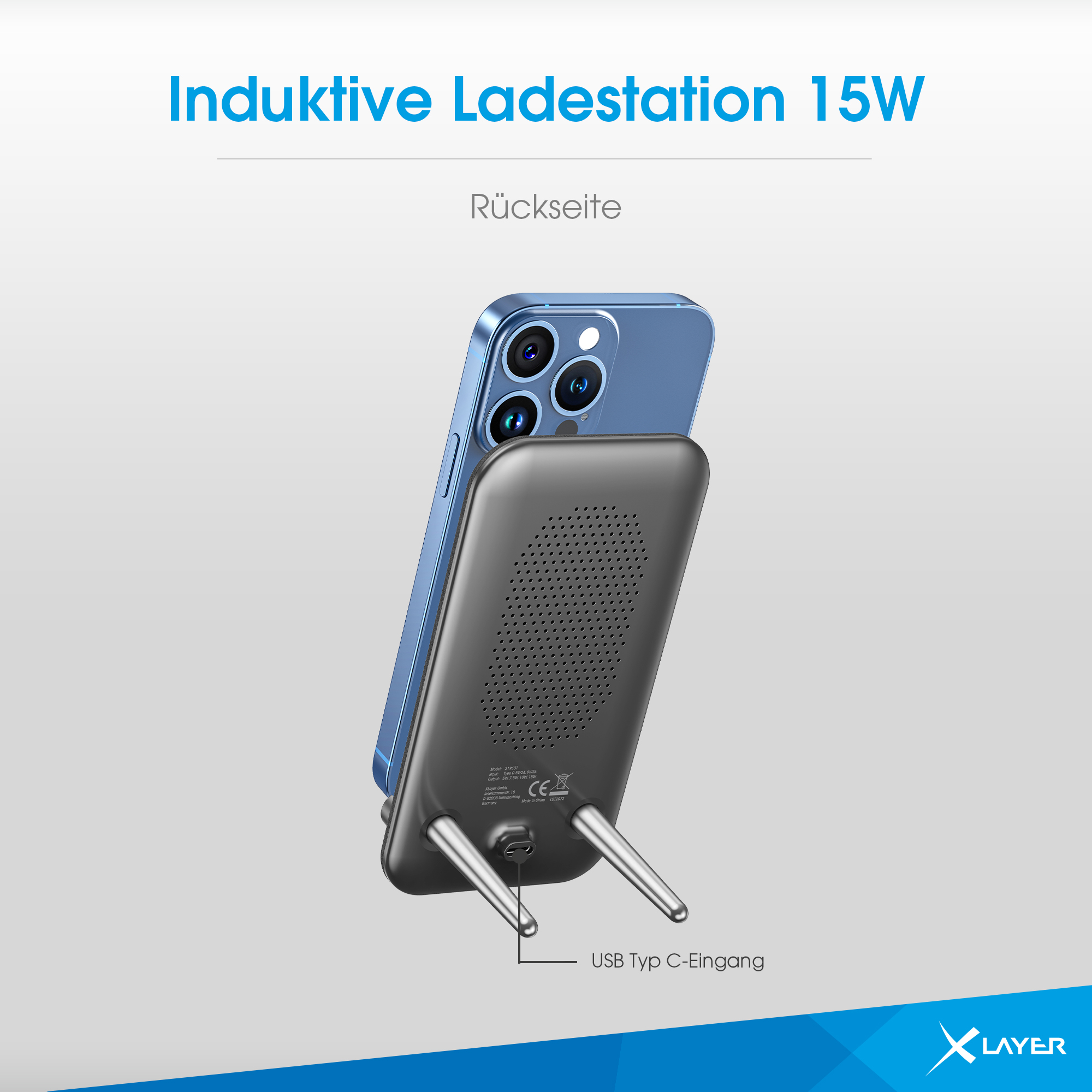 Ein schwarzes kabelloses Ladegerät mit einem blauen Telefon darauf und einem USB-C-Eingang.