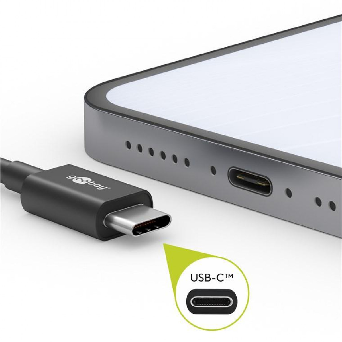 A USB-C cable is connected to a phone, with a diagram of the port.