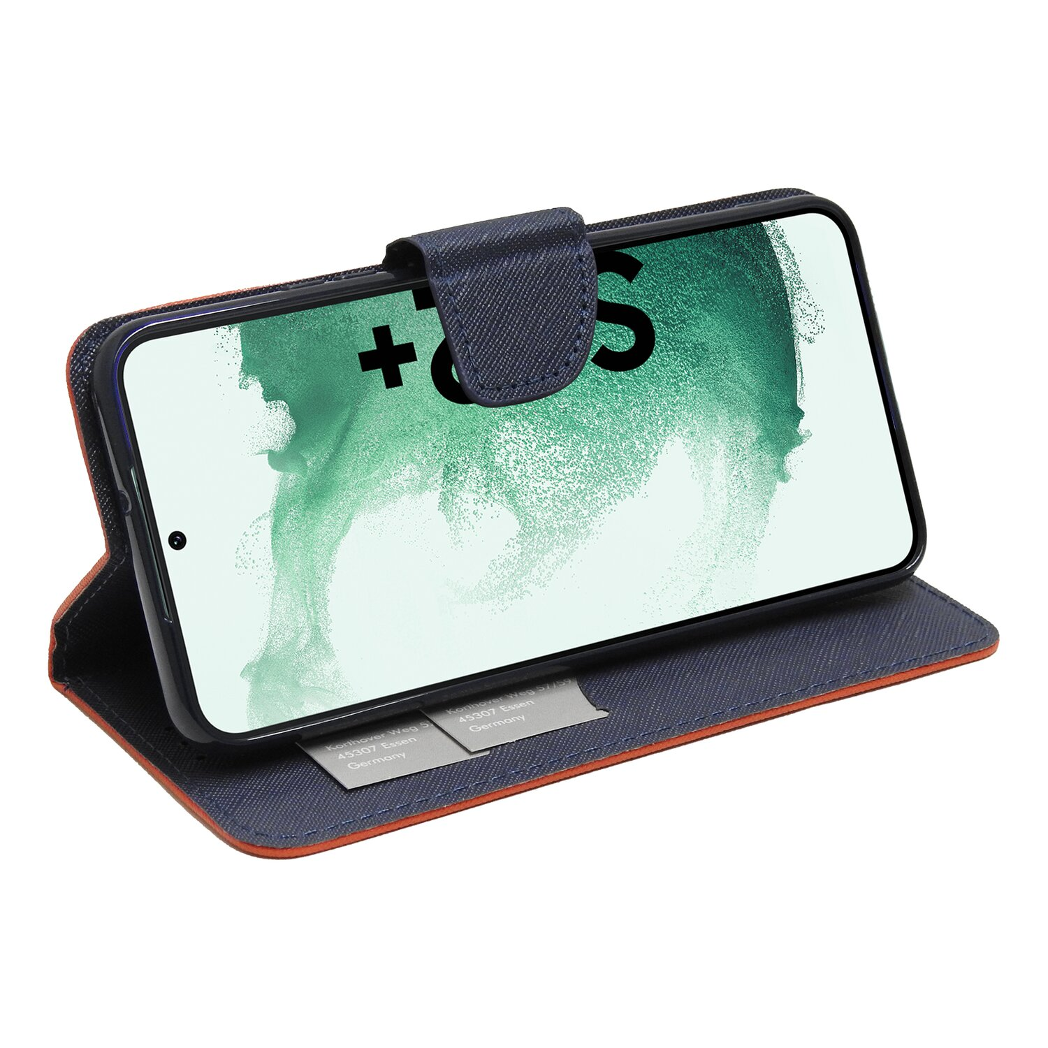 Ein Telefon in einem geöffneten Case. Das Telefon hat einen grünen Bildschirm und orangefarbene Zierleisten.