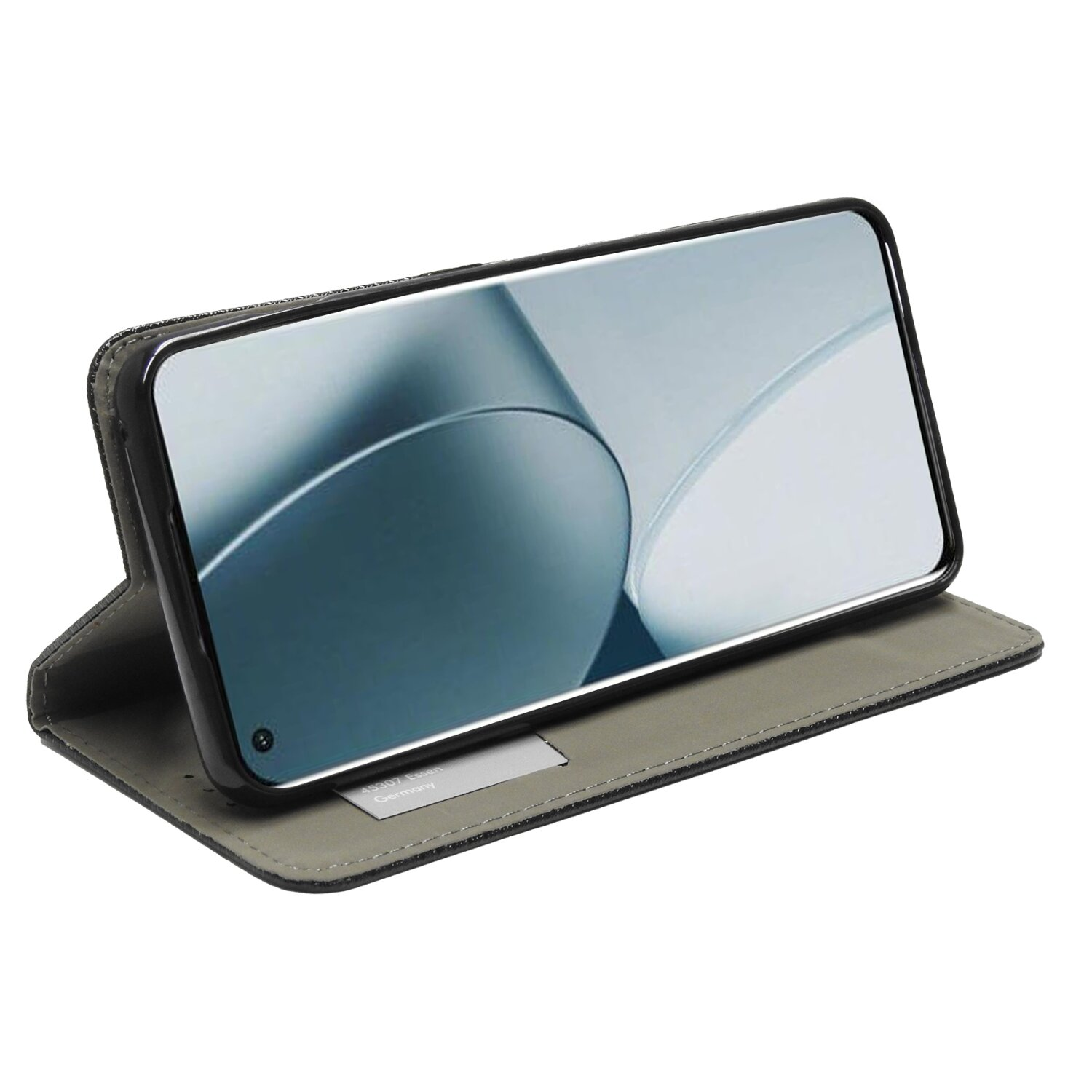 Telefon in einer grauen, strukturierten Hülle, geöffnet auf einer grauen Oberfläche. Der Bildschirm zeigt ein Bild.