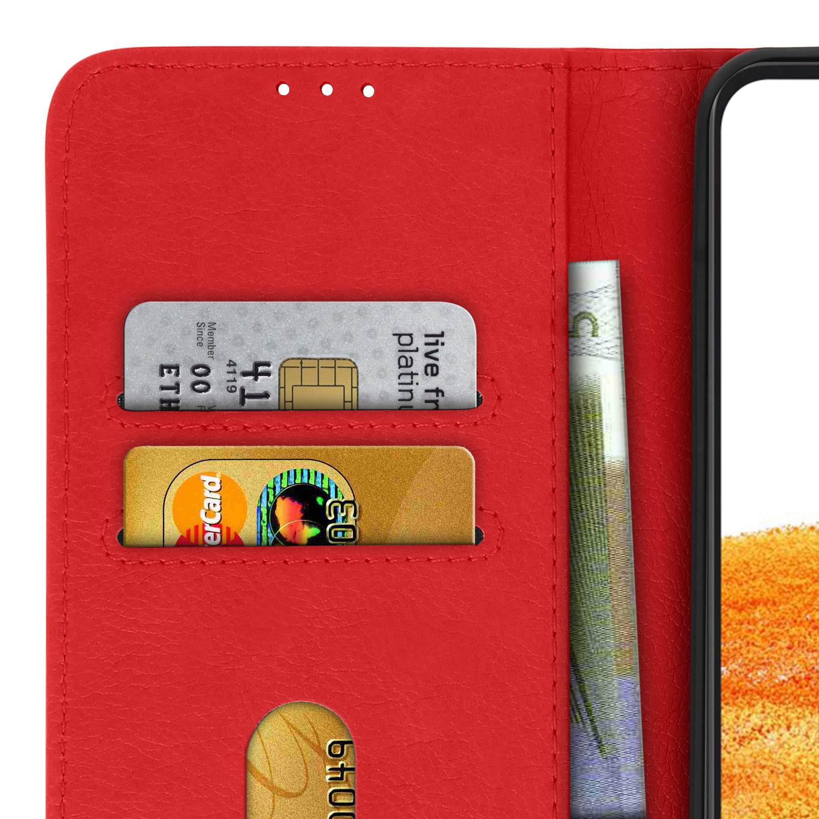 Gros plan de l'intérieur d'un étui de téléphone rouge avec des emplacements pour cartes et de l'argent. L'étui est ouvert.