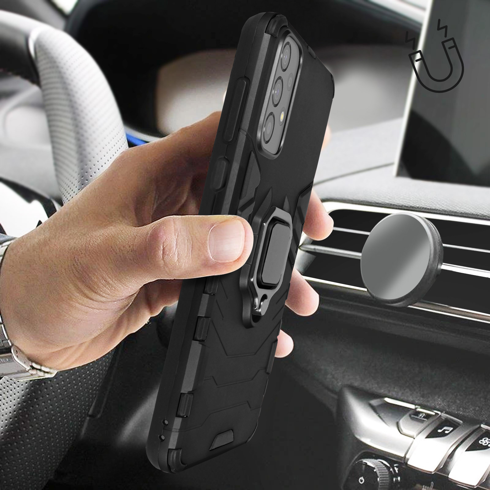 Mano che tiene custodia nera con anello in auto. Fissaggio magnetico.