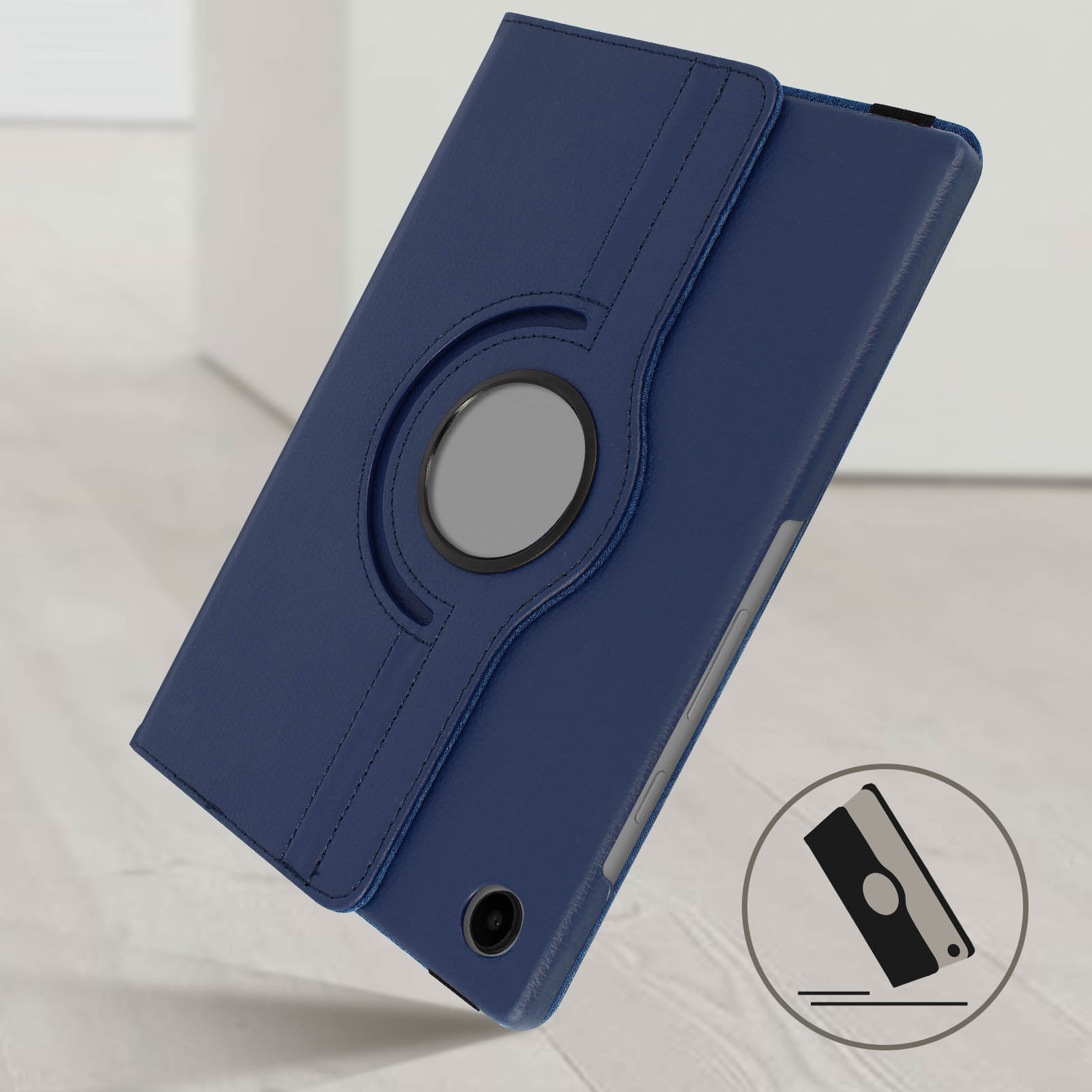 Custodia per tablet blu, ruotata, con anello girevole. Un tablet nero è all'interno. Superficie in legno.