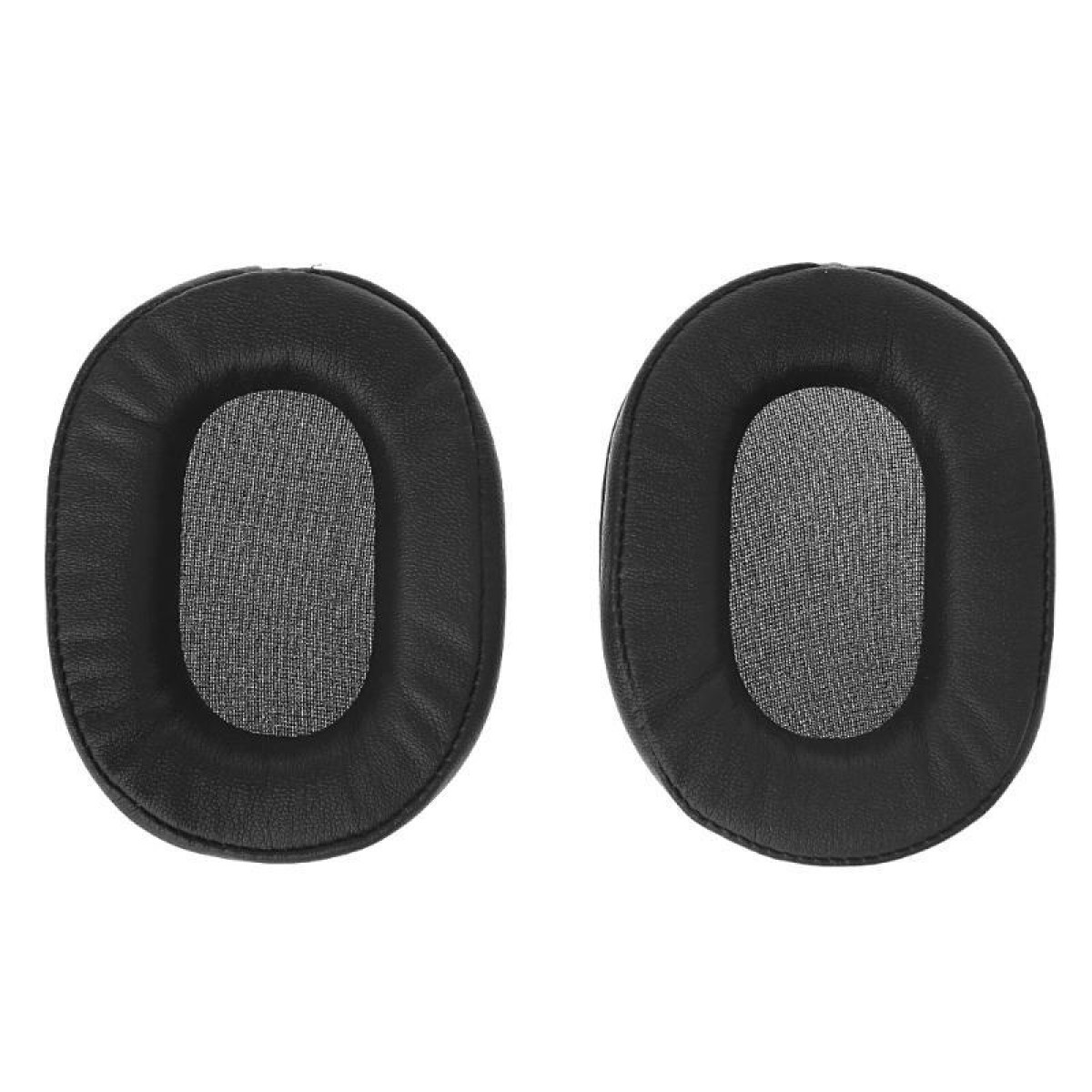 Deux coussinets d'oreille ovales noirs. Chacun a un centre en maille circulaire.