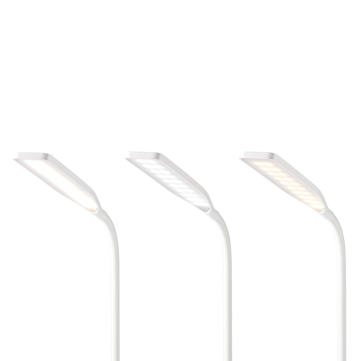 Tre lampade da scrivania a LED bianche con intensità luminose variabili, inclinate.