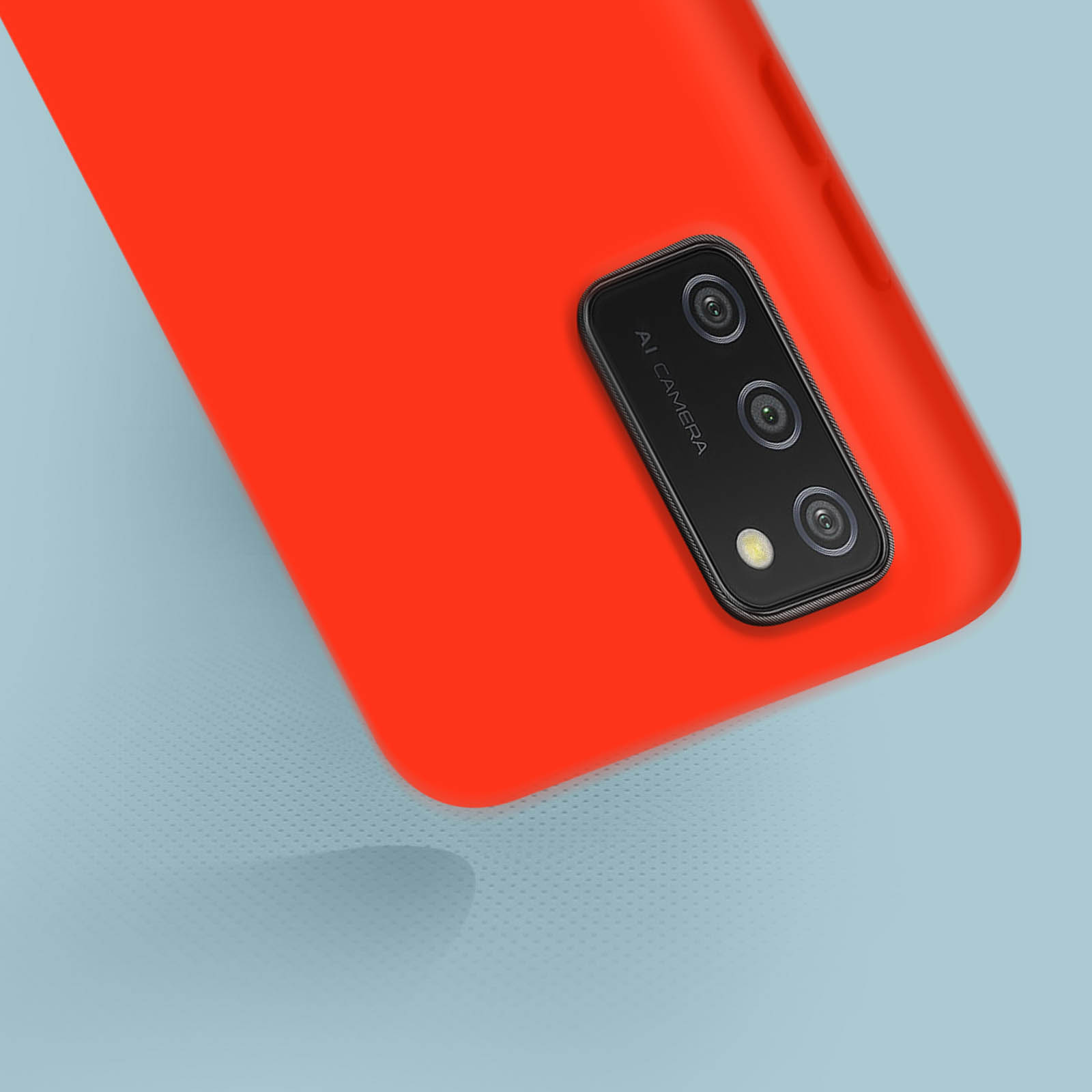 Una custodia per telefono rossa con un modulo fotocamera nero, su sfondo blu. Il telefono è parzialmente visibile.
