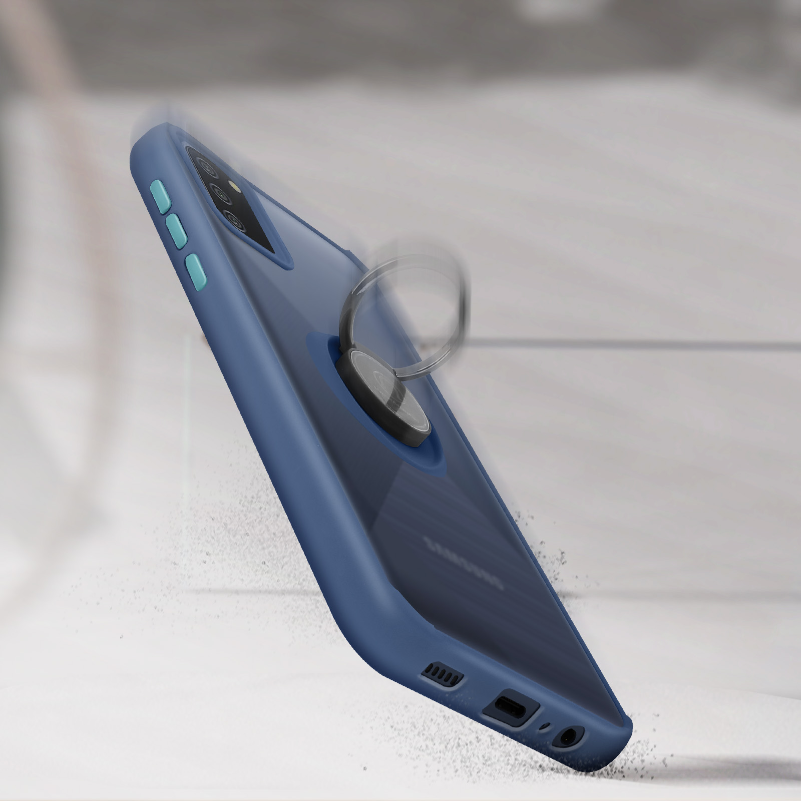 Custodia blu per telefono con anello, che cade. Superficie grigia, che mostra un telefono.