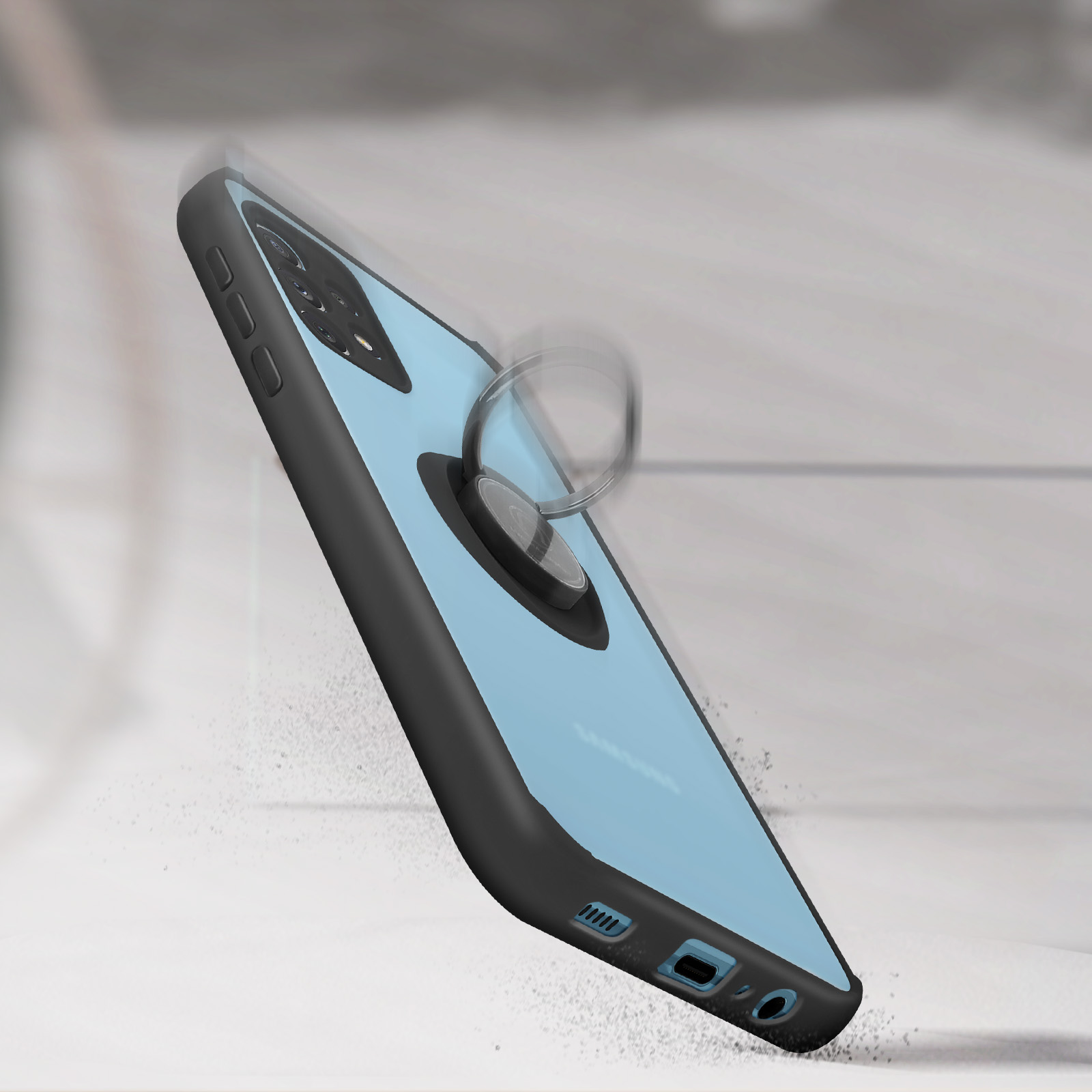 Coque de téléphone bleue avec un support de bague, tombant avec des débris.