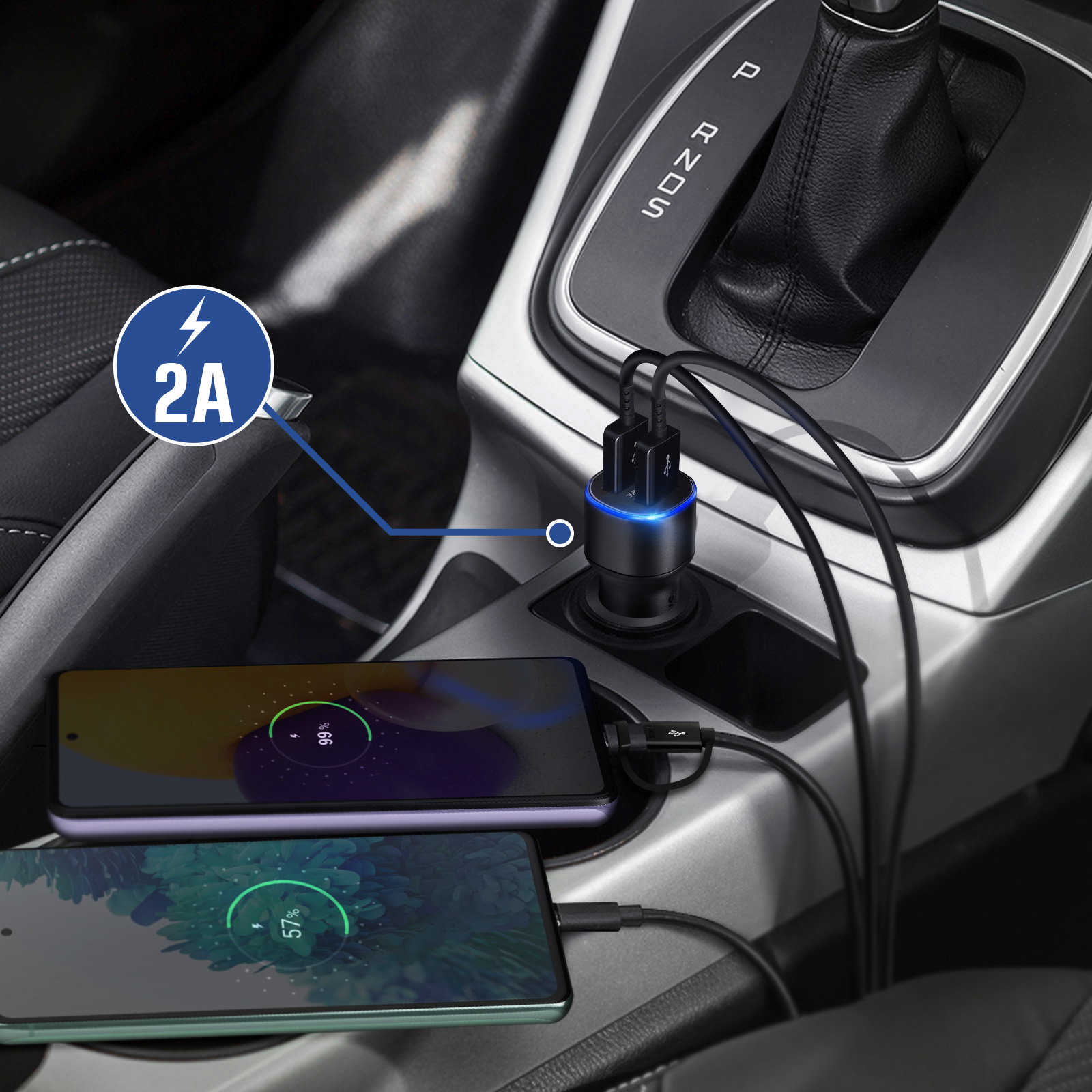 Dos teléfonos cargando en un coche. Uno tiene un 99% de carga, el otro 57%. Un cargador es visible.