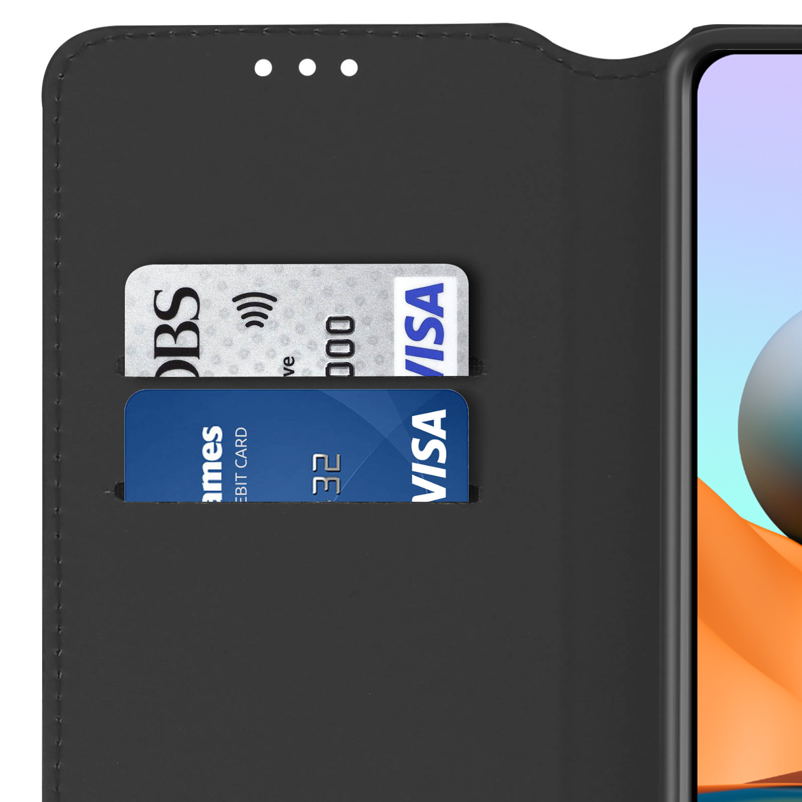Primo piano di una custodia per telefono con carte di credito e un telefono visibile.