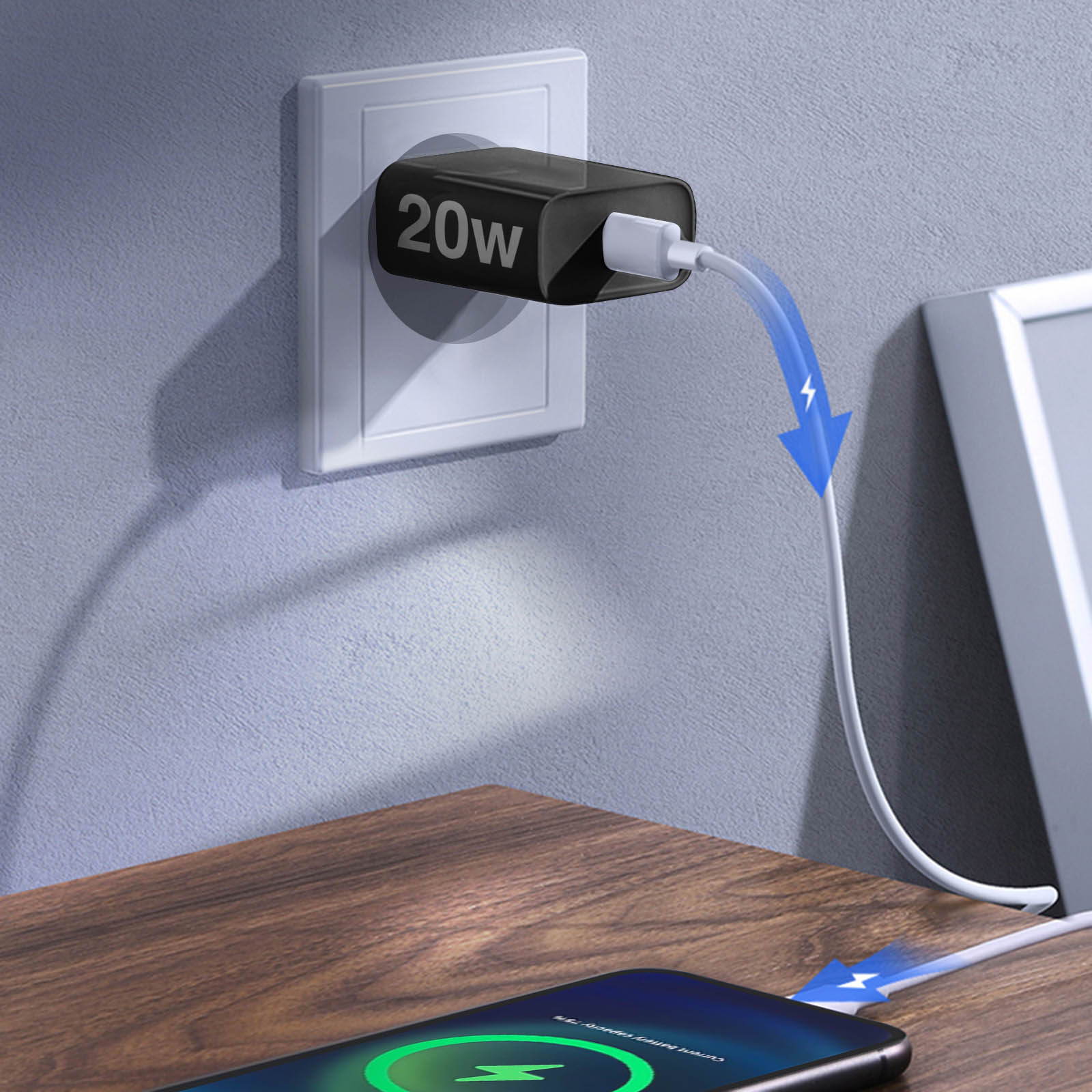 Schwarzes 20-W-Ladegerät in der Wand. Ein Telefon wird auf dem Holztisch geladen.