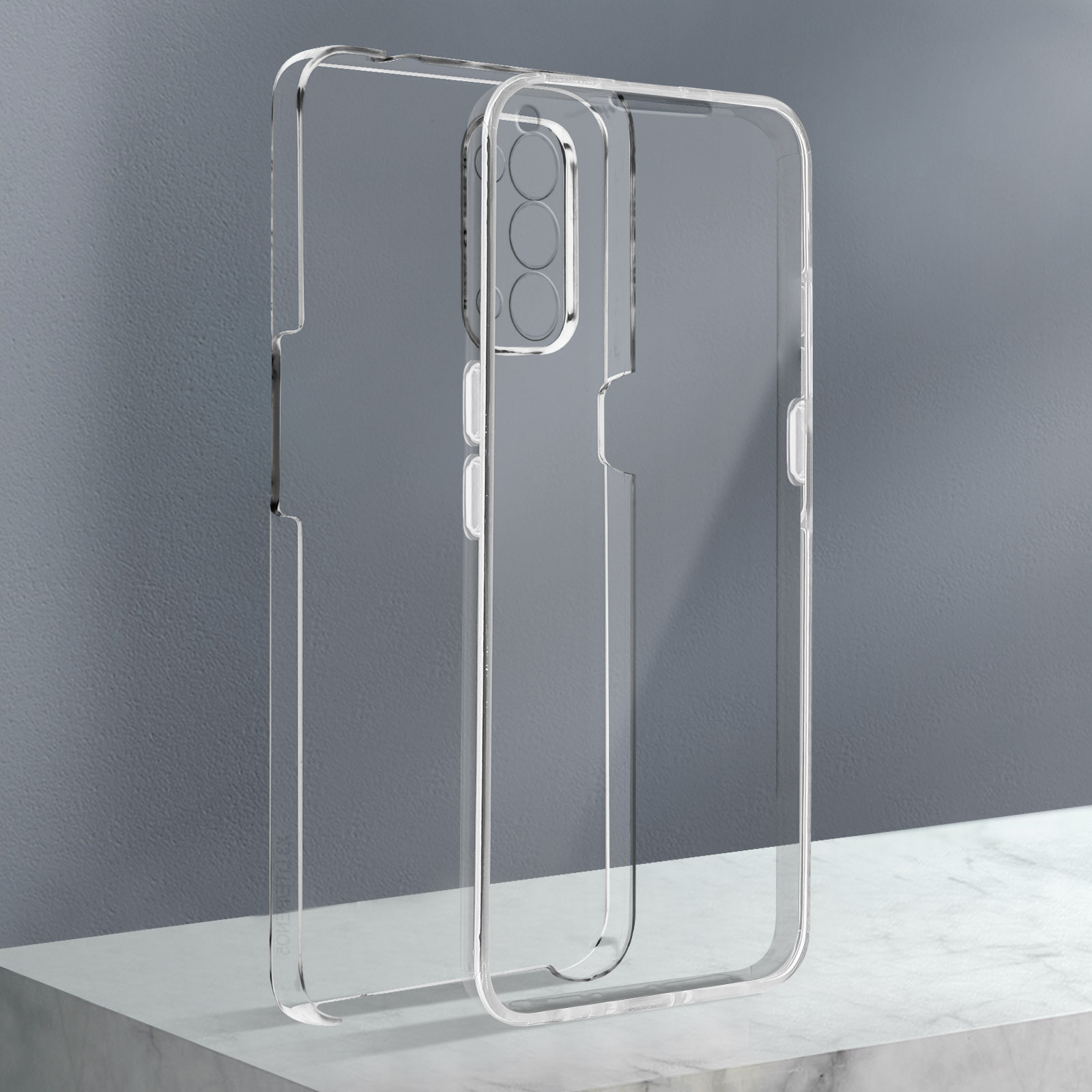 Custodia trasparente per telefono, con tre fori per fotocamera, su superficie di marmo e sfondo grigio.