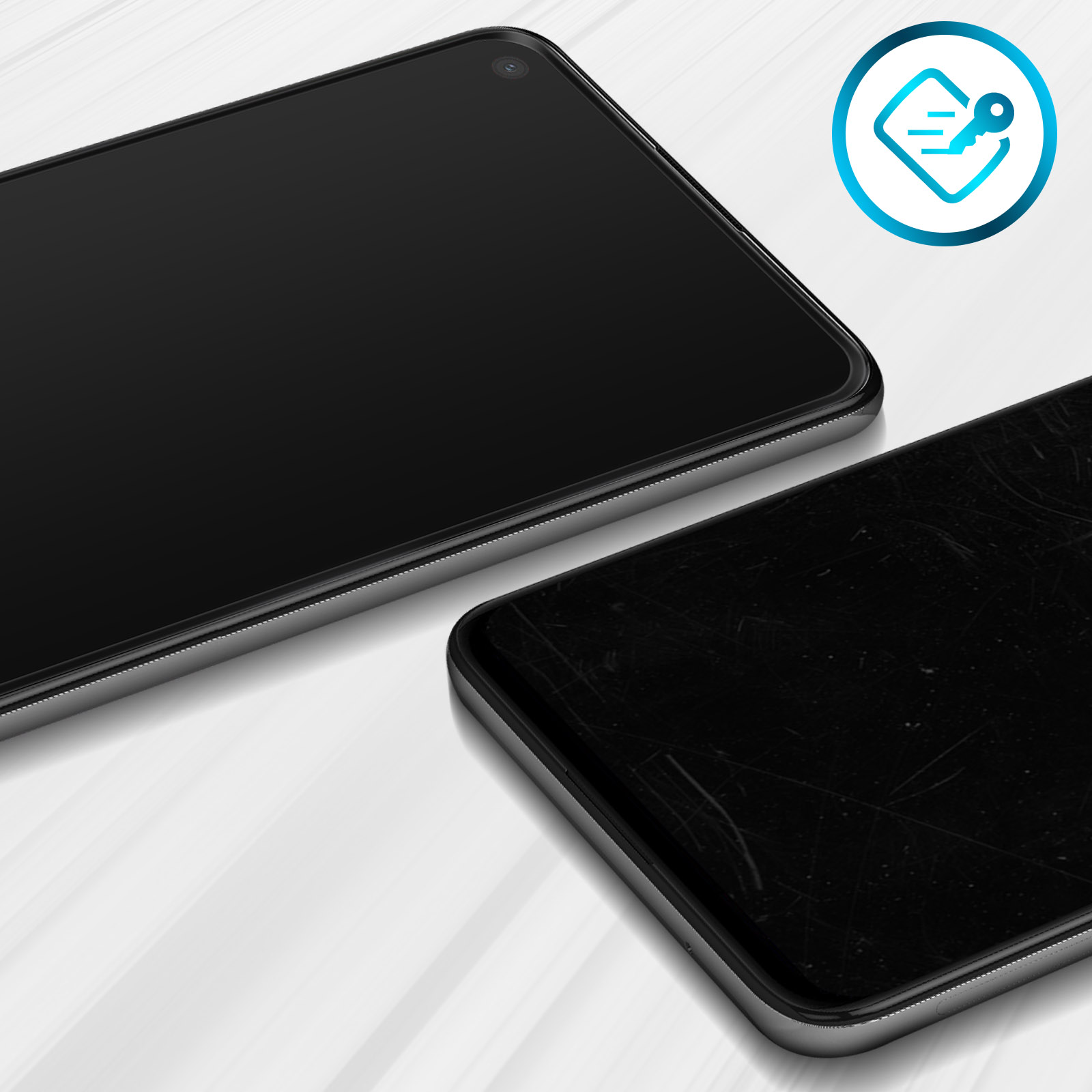 Due smartphone neri con graffi visibili e un'icona a forma di chiave su una superficie bianca.