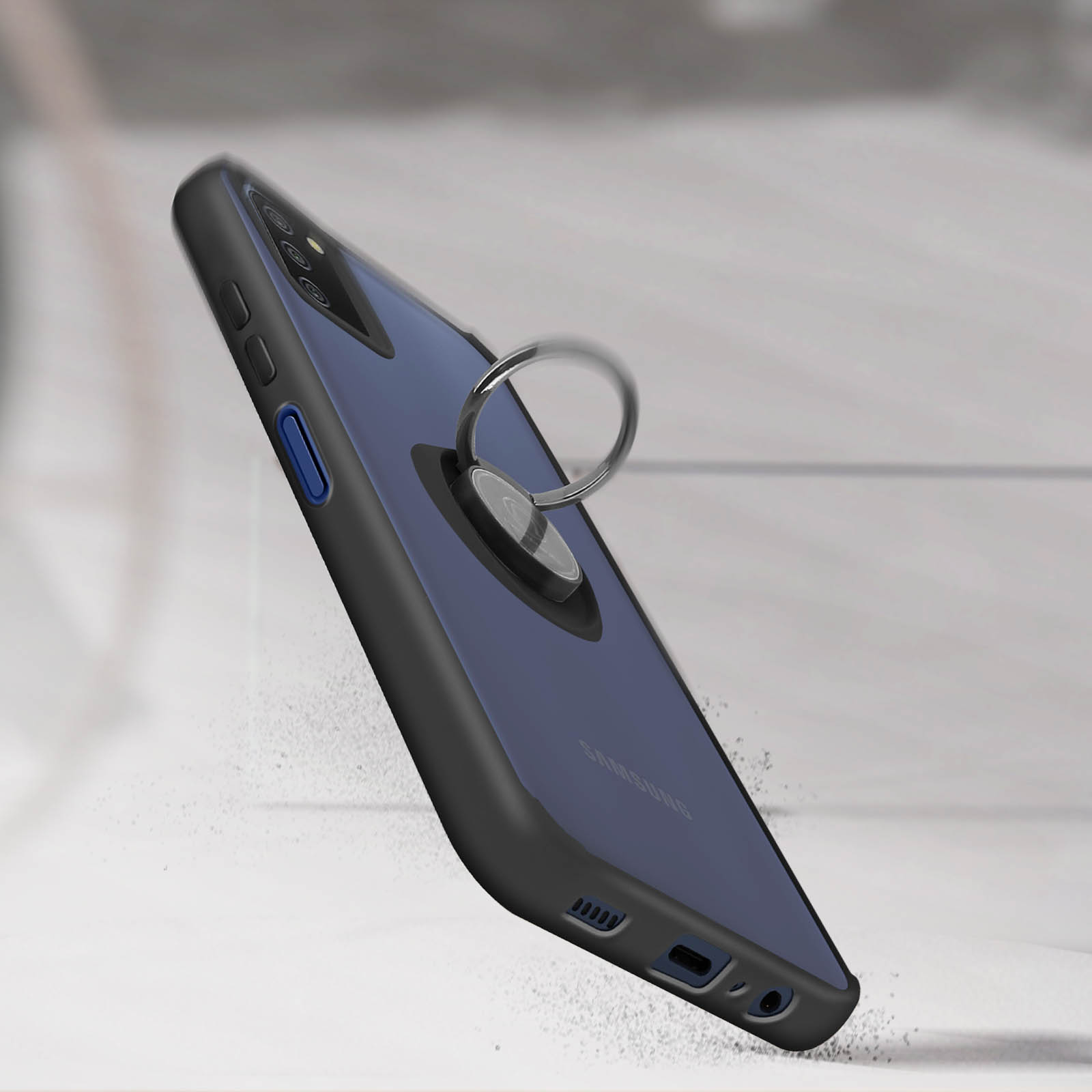 Custodia blu e nera per telefono con anello. Caduta di particelle di polvere.
