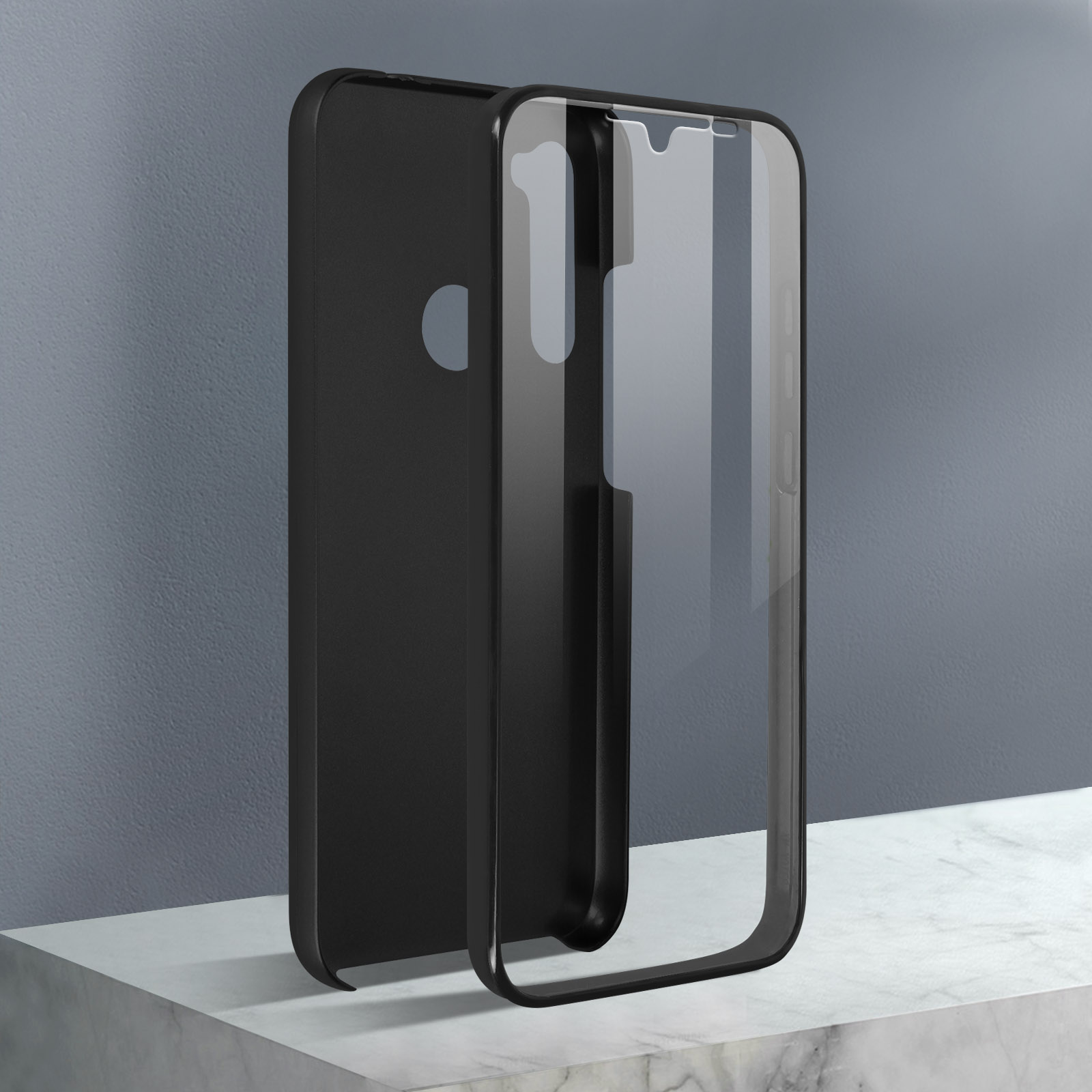 Zwarte telefoonhoes, met een open ontwerp. De transparante voorkant is gescheiden van de achterkant op een grijs oppervlak.