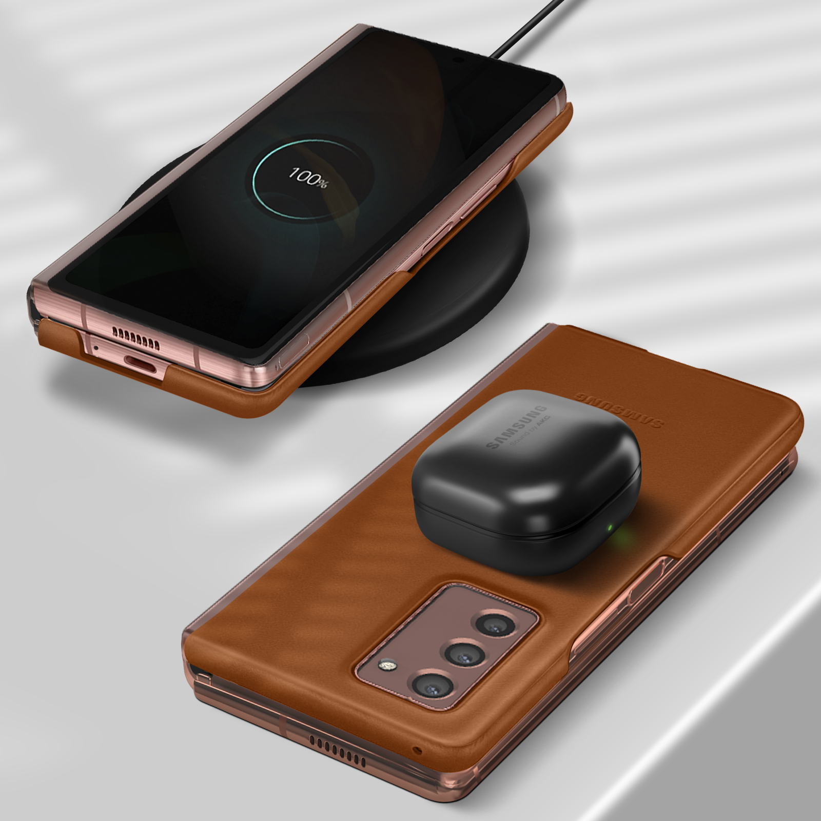 Deux téléphones, l'un chargeant sur un socle et l'autre avec un étui de charge.
