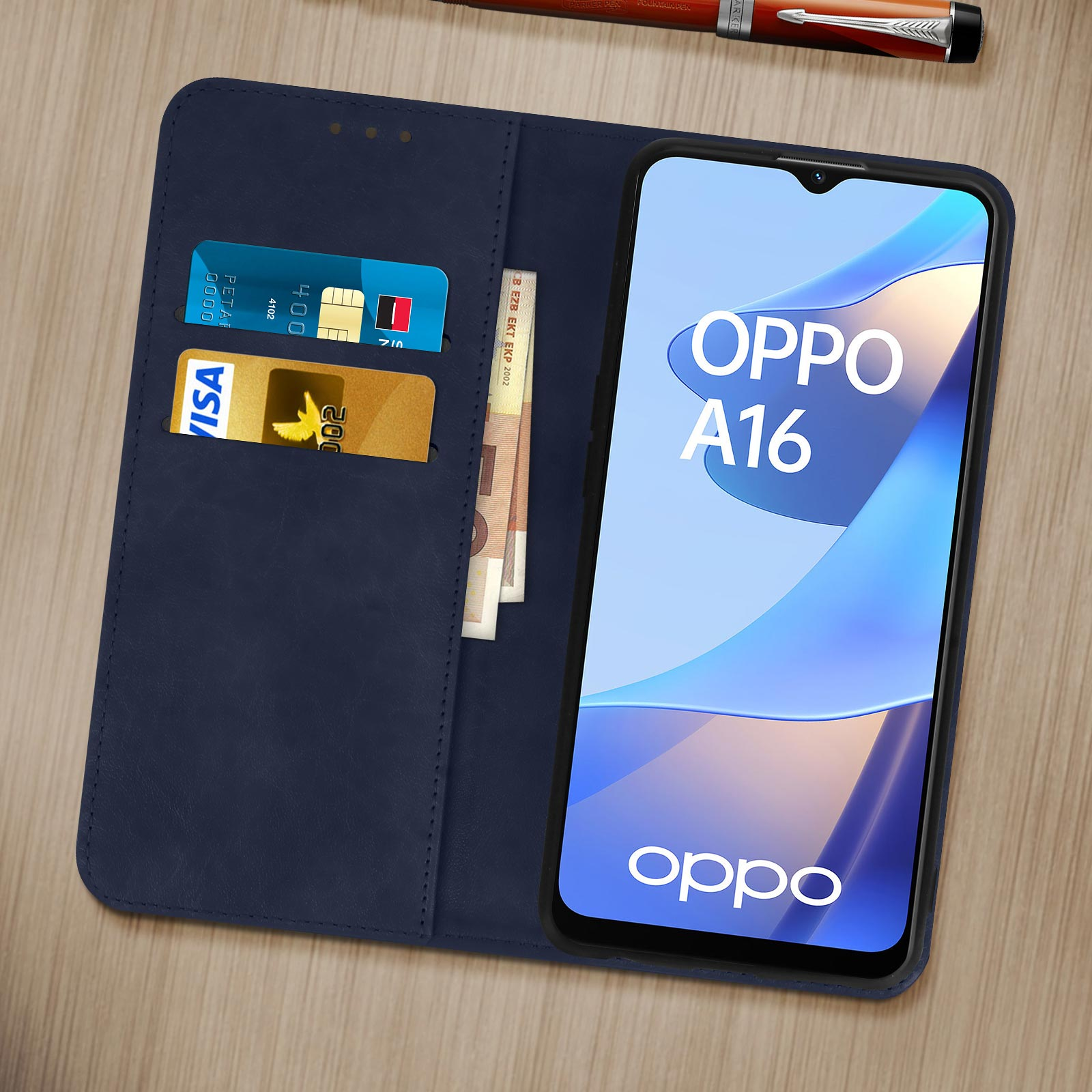 Custodia blu aperta con un telefono che mostra OPPO A16 e carte di credito all'interno. C'è una penna accanto.