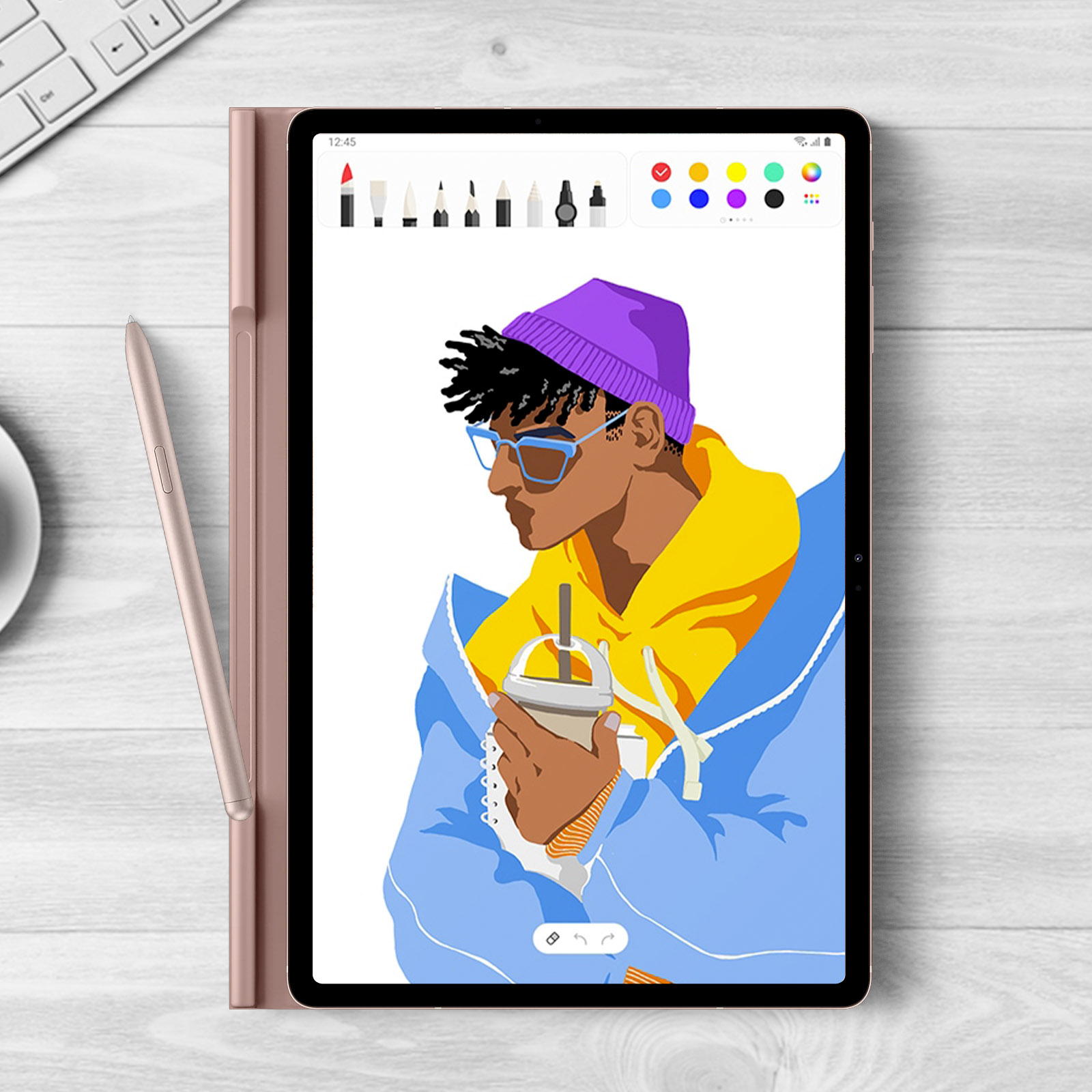 Tablet con disegno sullo schermo, stilo e custodia. Una persona è disegnata.