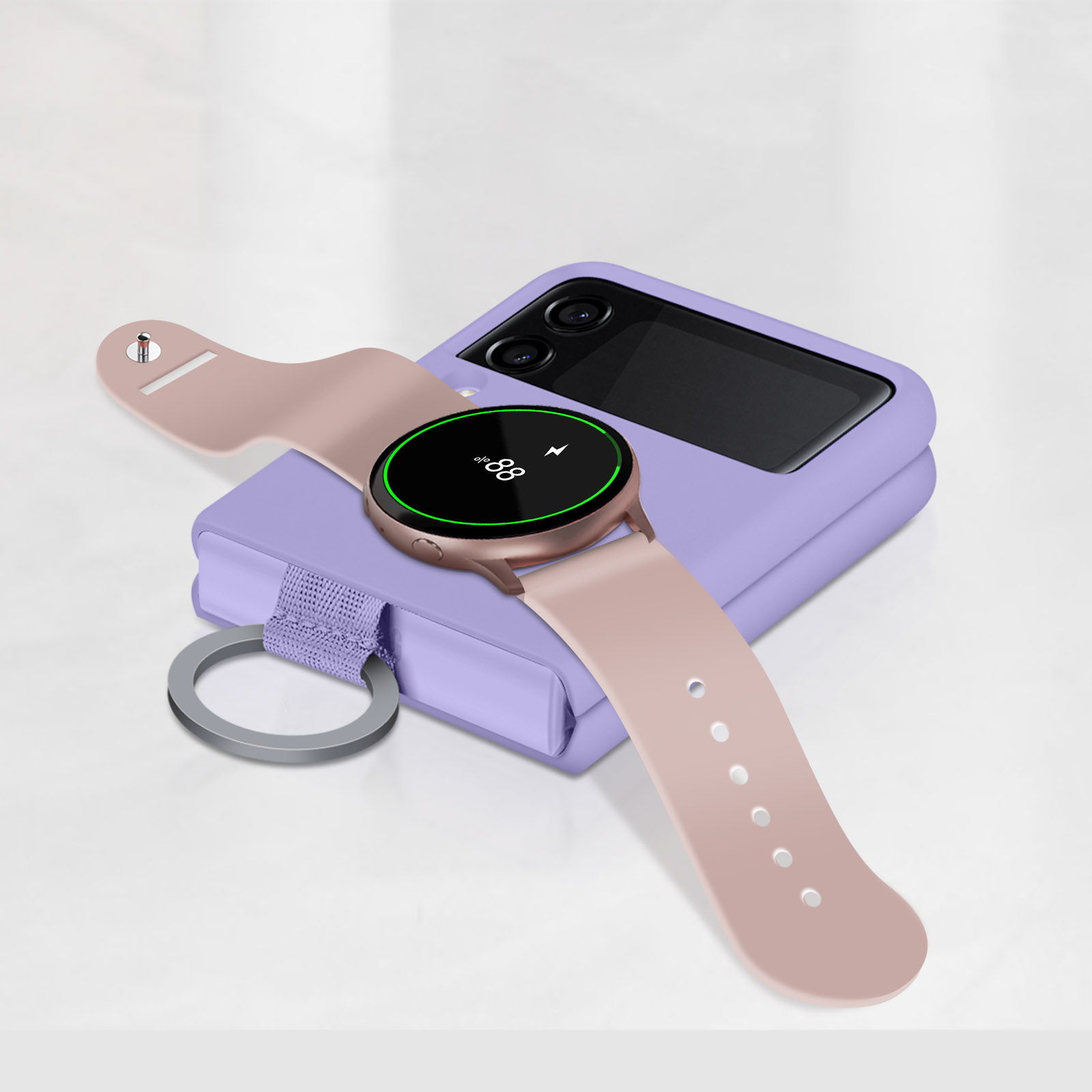 Orologio e telefono rosa. La custodia del telefono è viola. L'orologio è in carica. Il segno di carica è sullo schermo dell'orologio.