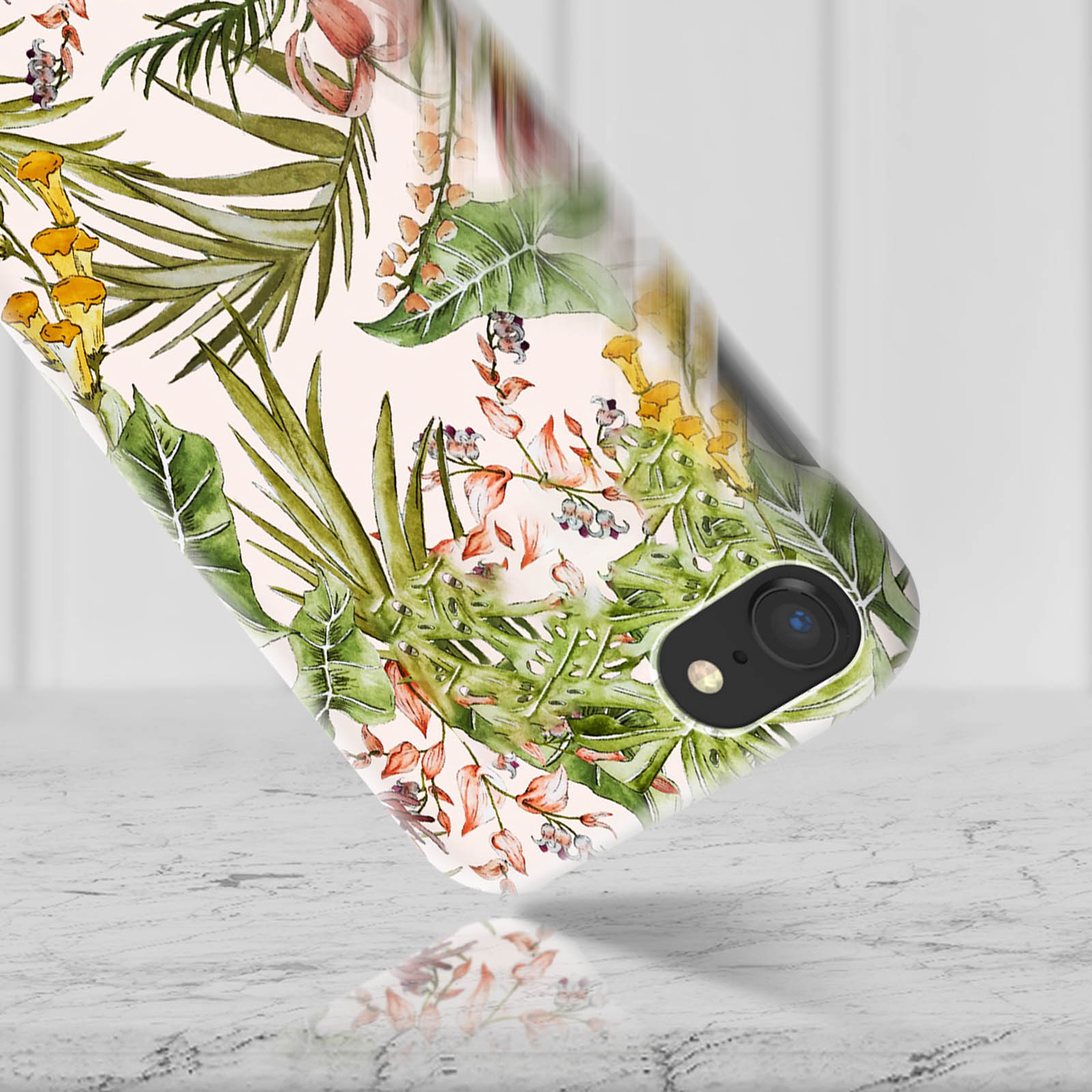 Custodia per telefono con un design floreale. Sfondo bianco.