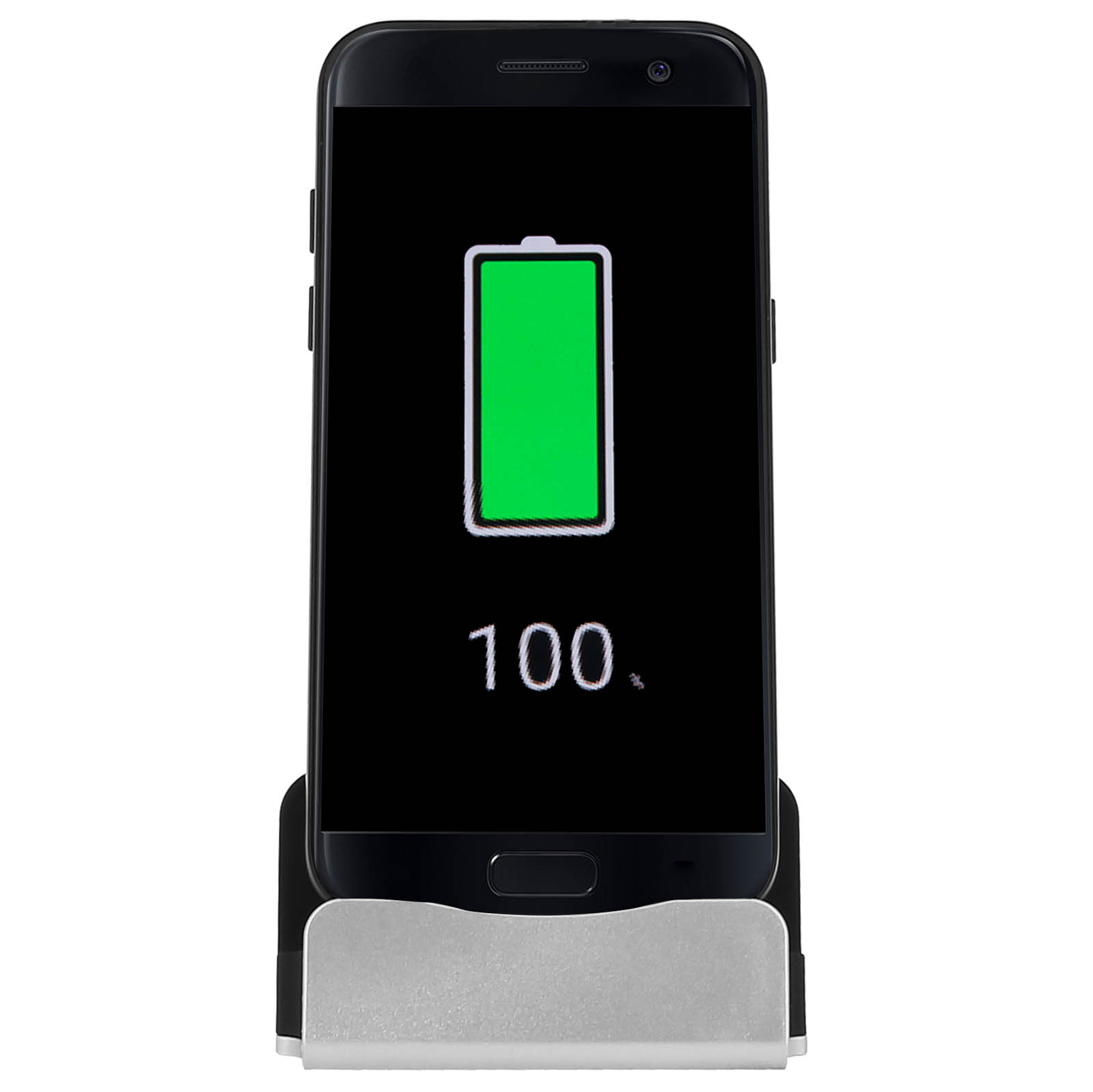 Telefono nero in un supporto, schermo che mostra carica al 100%. Base del supporto argentata.
