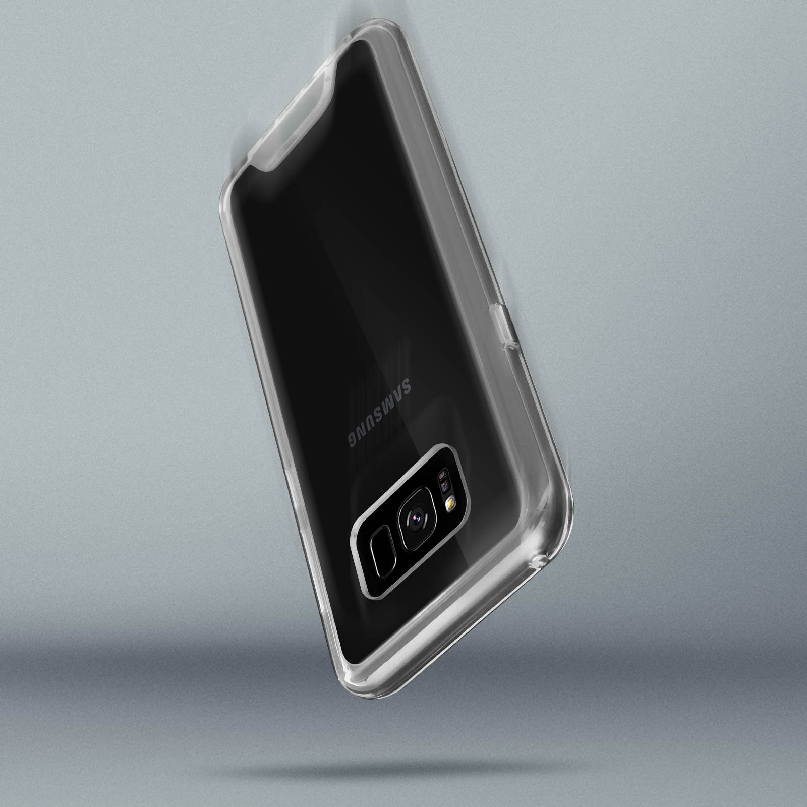 Funda transparente con un teléfono Samsung dentro, contra un fondo gris. La cámara es visible.