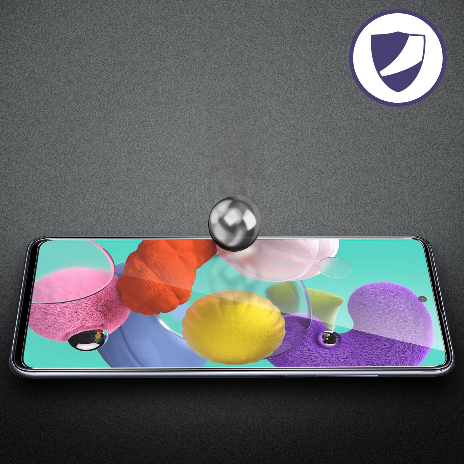 Schermo del telefono che mostra forme colorate con vetro protettivo, su superficie nera.