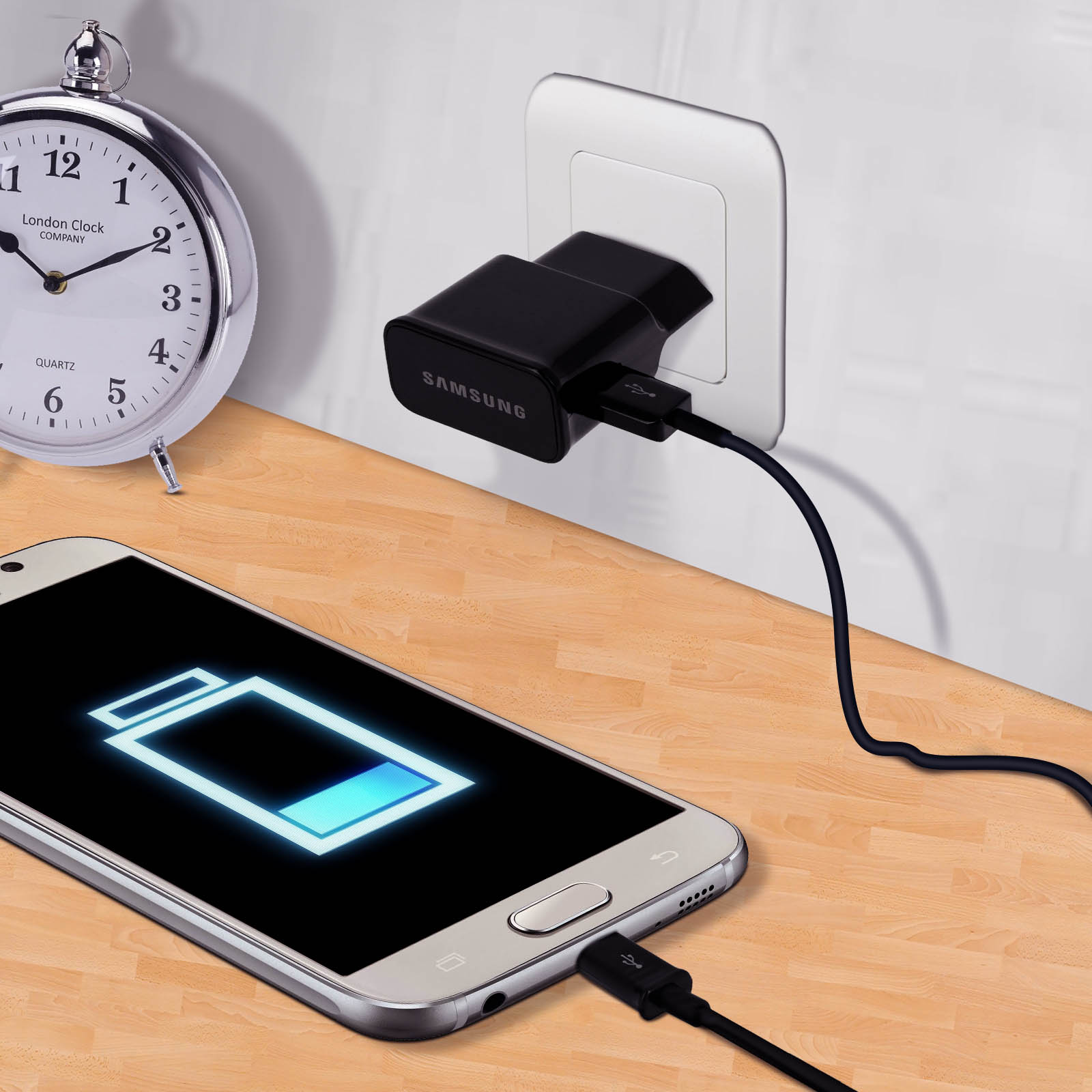 Un smartphone se rechargeant sur une surface en bois, connecté à un chargeur noir.