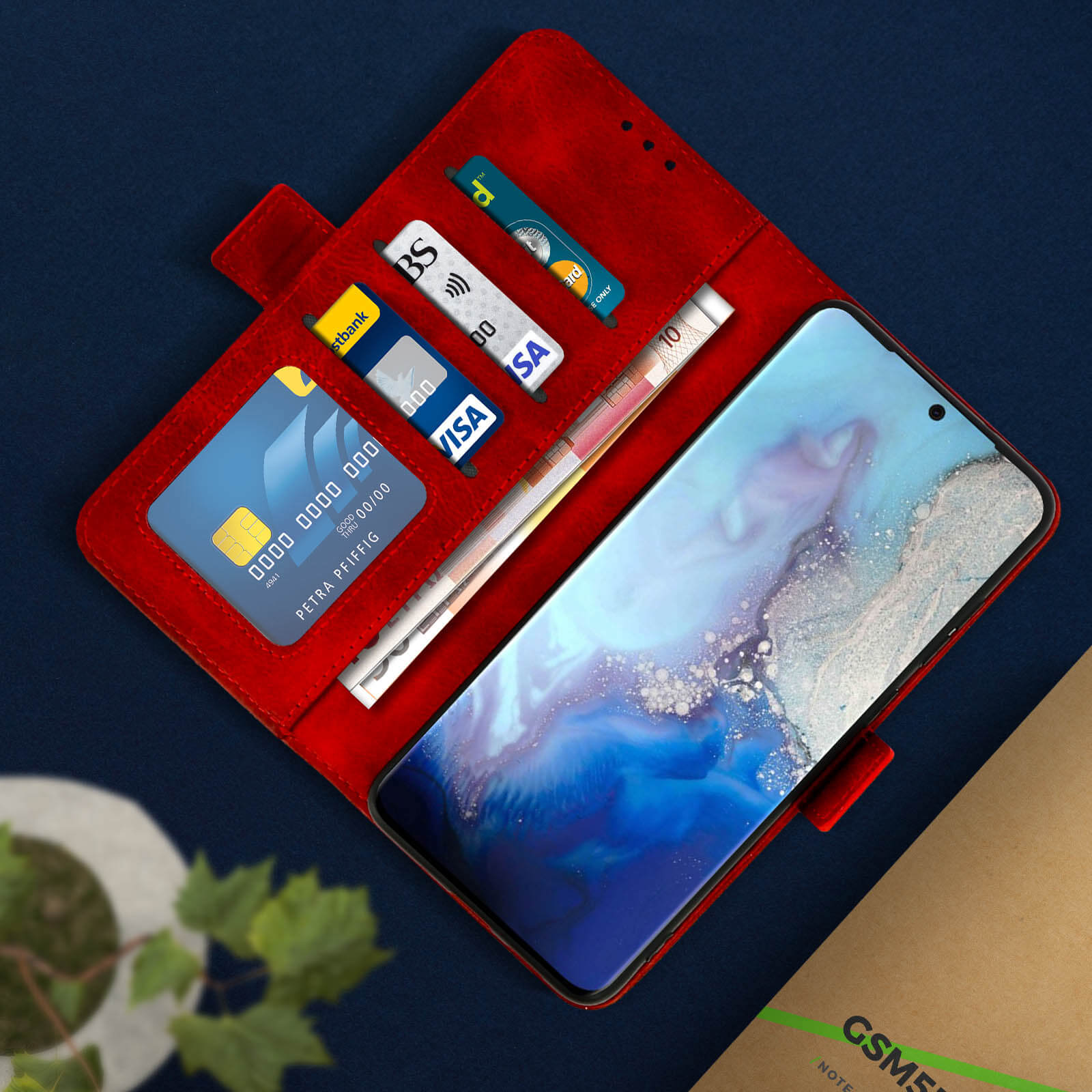 Custodia rossa per telefono aperta, che mostra lo schermo del telefono e carte di credito all'interno.