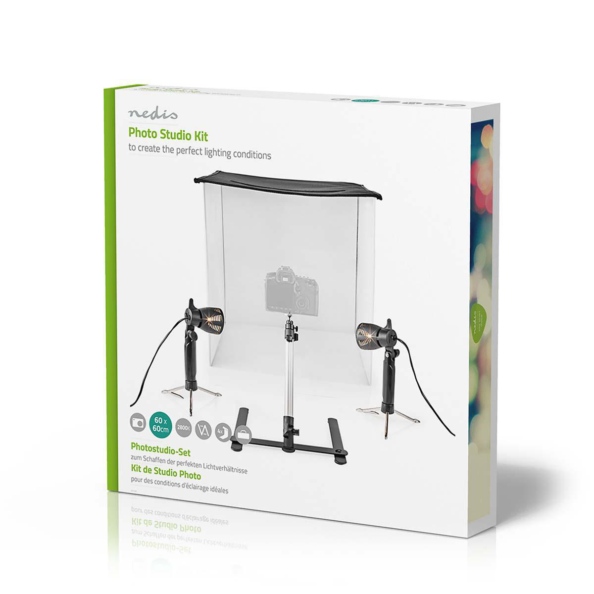 Doos met een fotostudio kit. Kit bevat lampen, een camerastatief en een fototent.